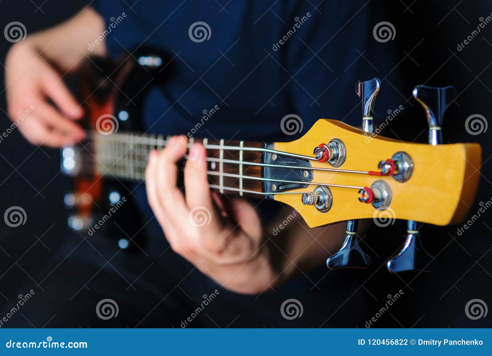 Rock Guitarist Practicing with Bass Guitar. Stock Photo Image of rock