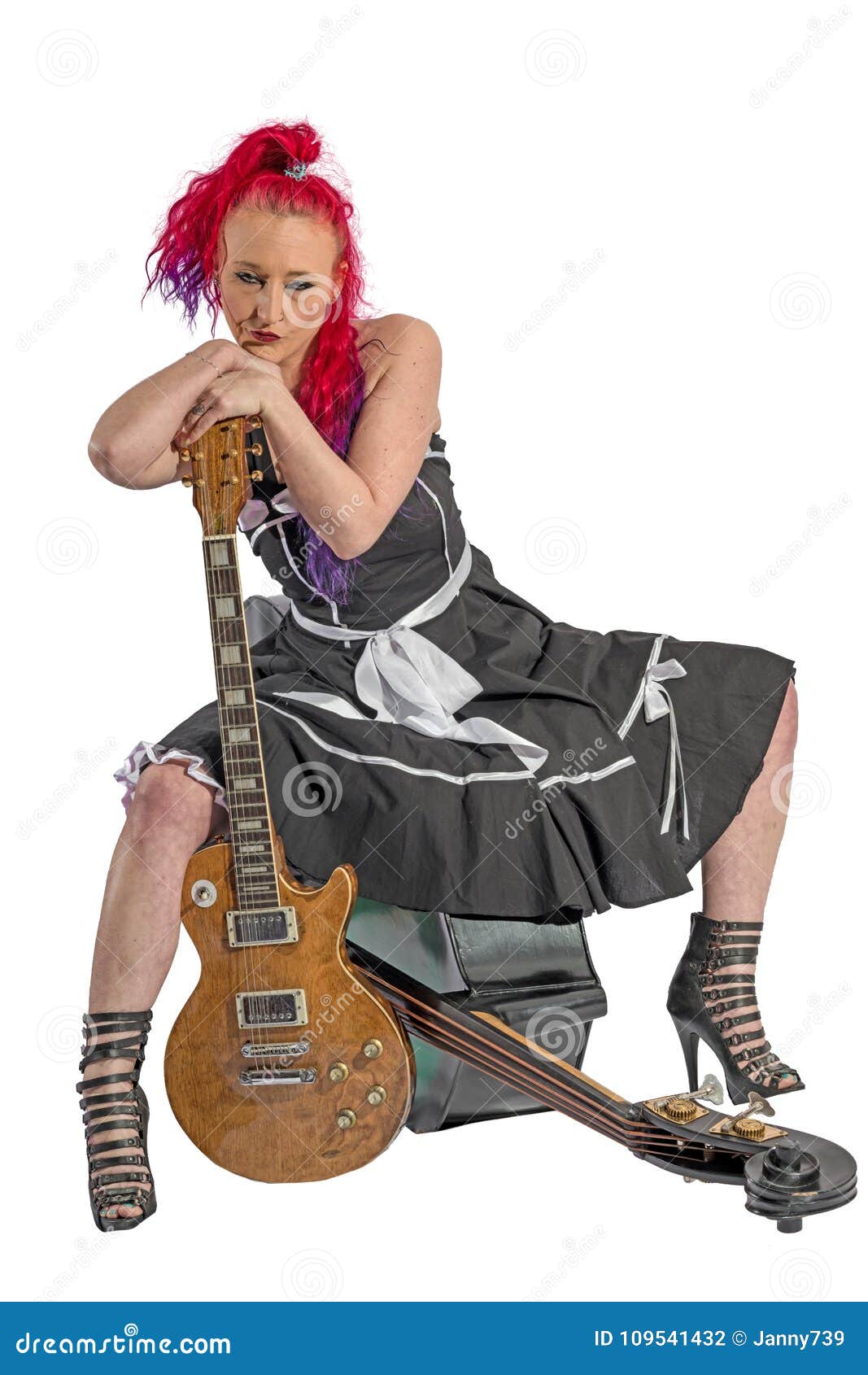 Rock N Roll Singer With Red Hair Sits On A Double Bass Stock Photo Image Of Rockabilly Dress 109541432