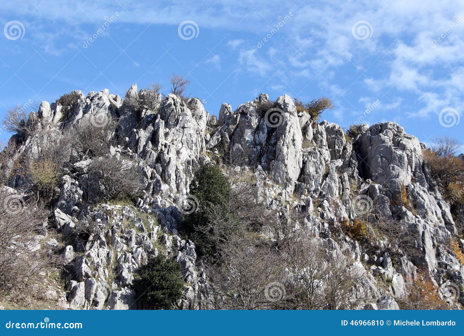 rock outcroppings in autumn, sunny day
