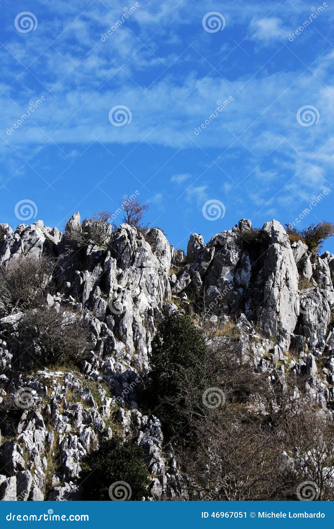rock outcroppings in autumn, sunny day