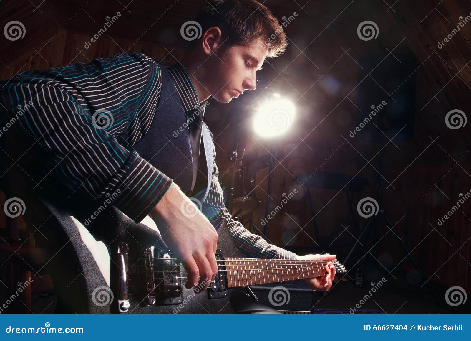 Rock star with a guitar stock photo. Image of instrument 66627404
