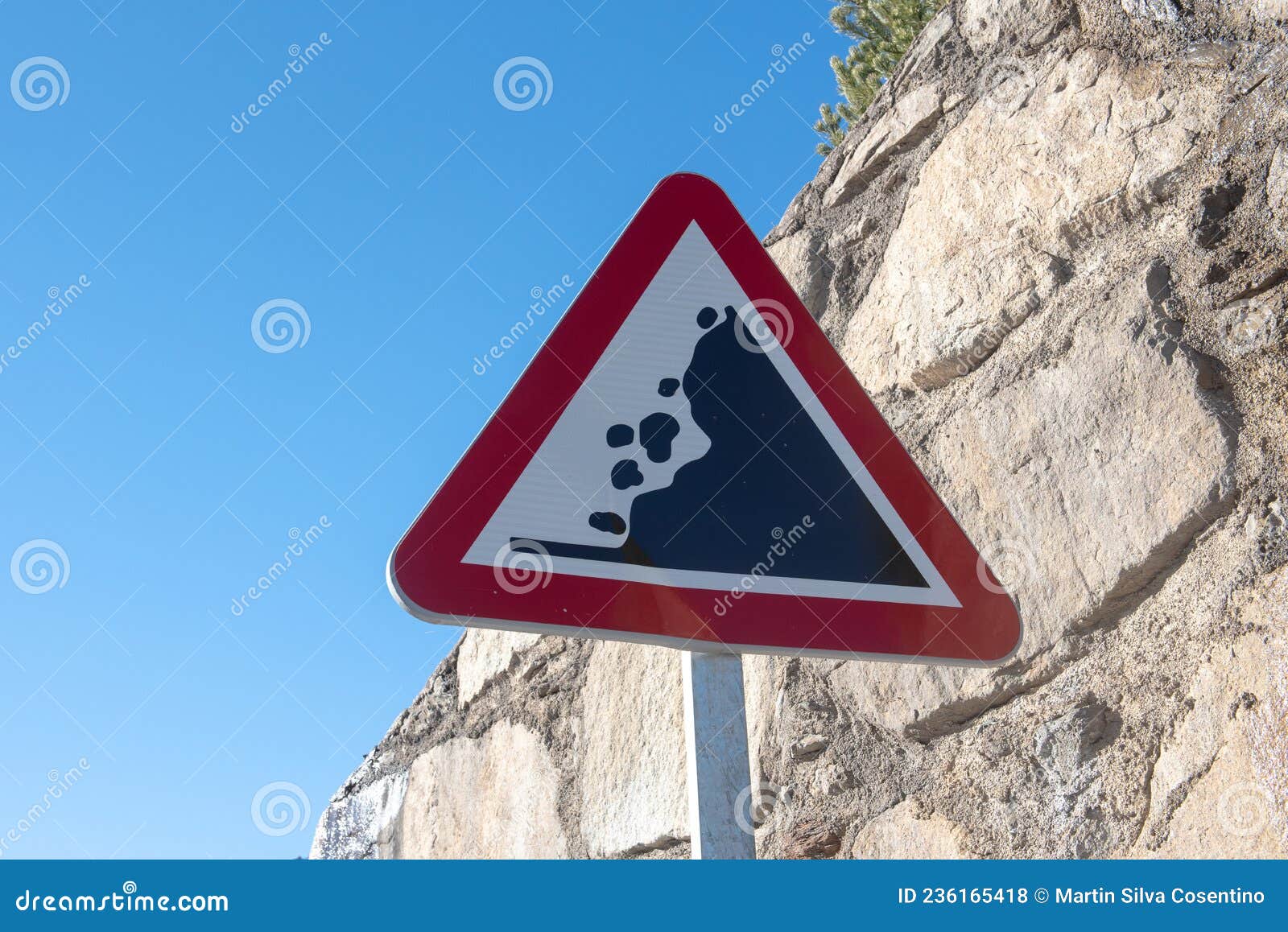 Rockfall sign on the road stock photo. Image of black - 236165418