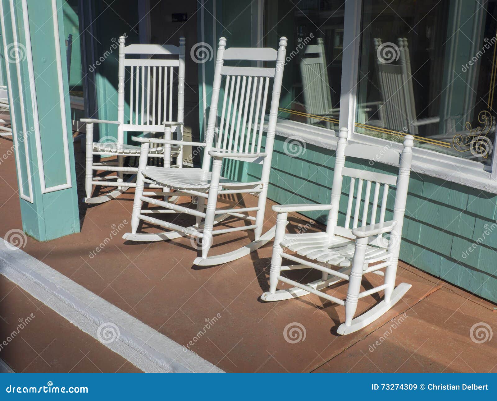 Rocking Chairs On Store Sidewalk Stock Image Image Of Wood