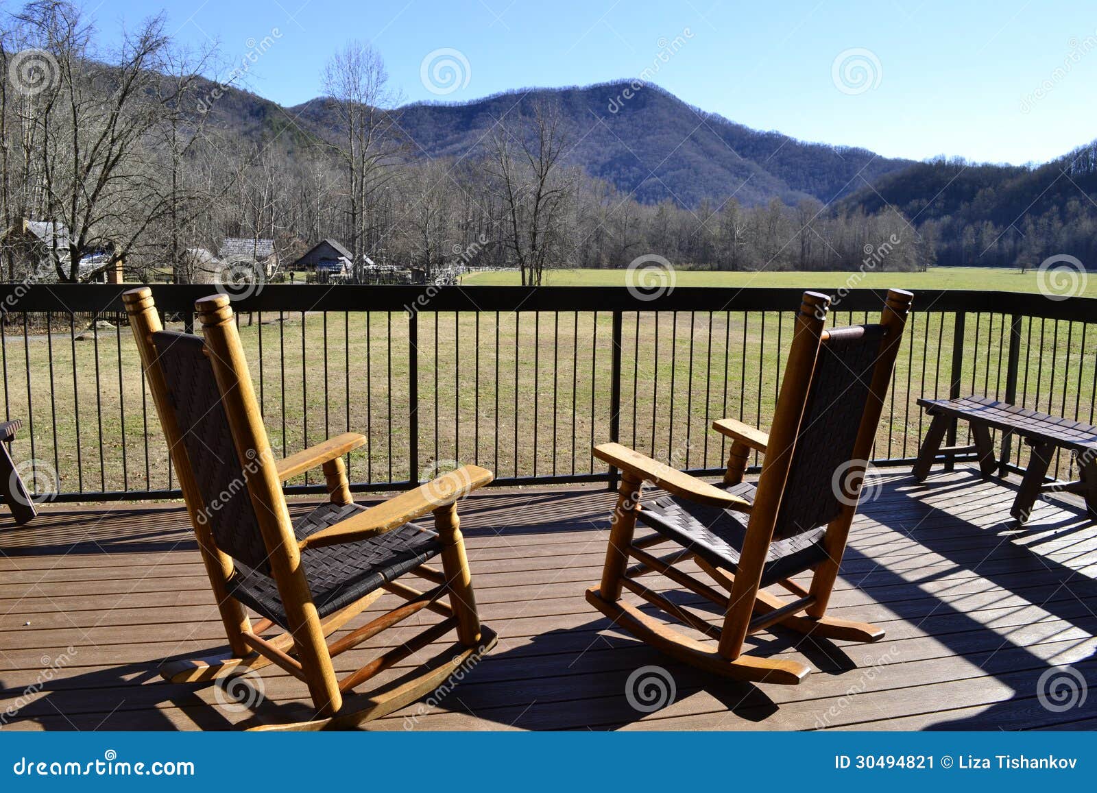 rocking chairs two wooden rear porch overlooking great smoky mountains 30494821