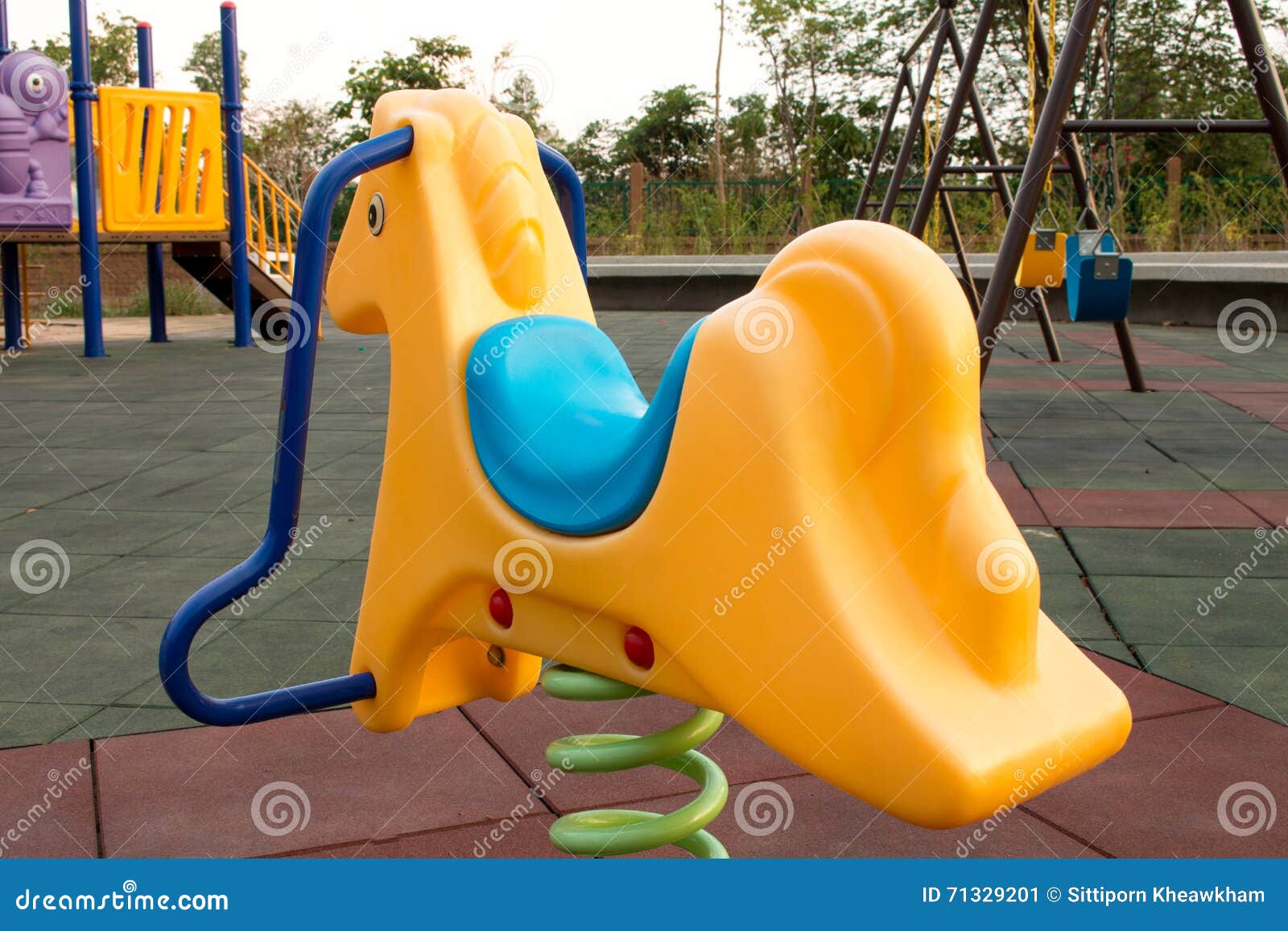 Rocking horse in the park stock image. Image of color 71329201