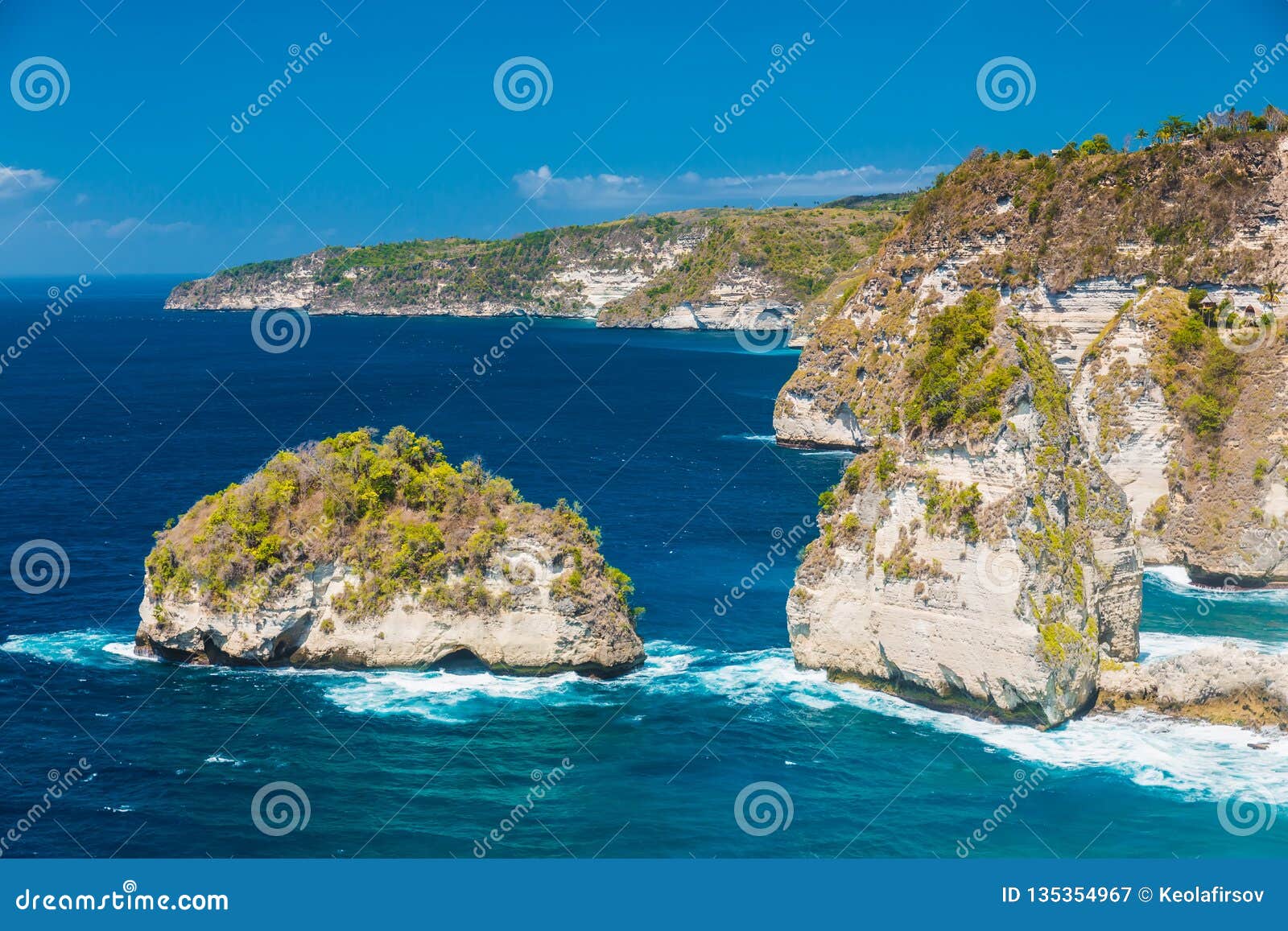 Rocky Cliff and Blue Ocean in Nusa Penida Island, Indonesia Stock Image