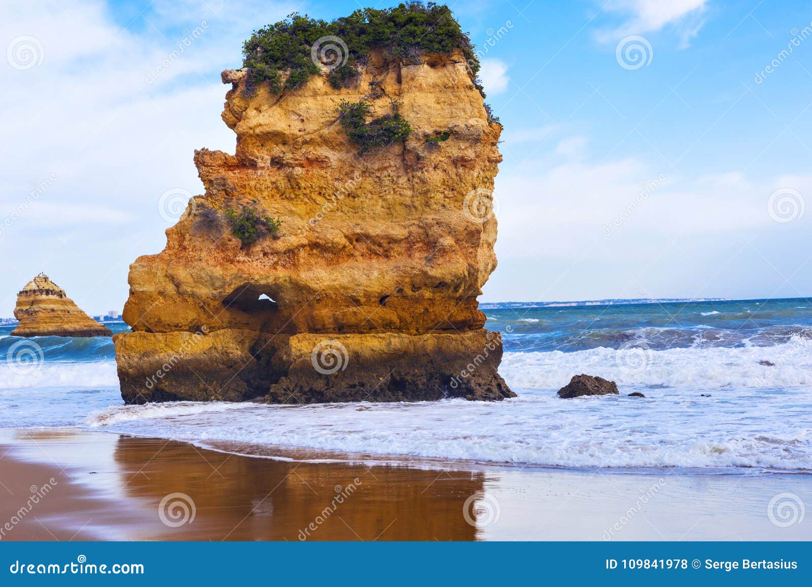 rocky cliff of praia dona ana at lagos, portugal