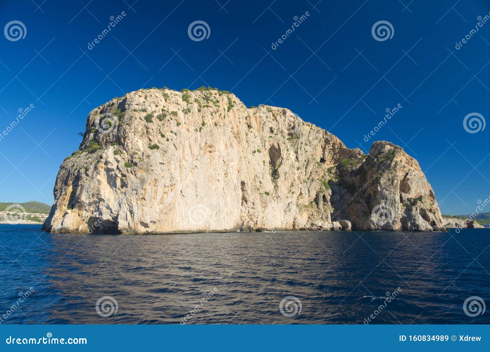 rock and cliff in blue sea