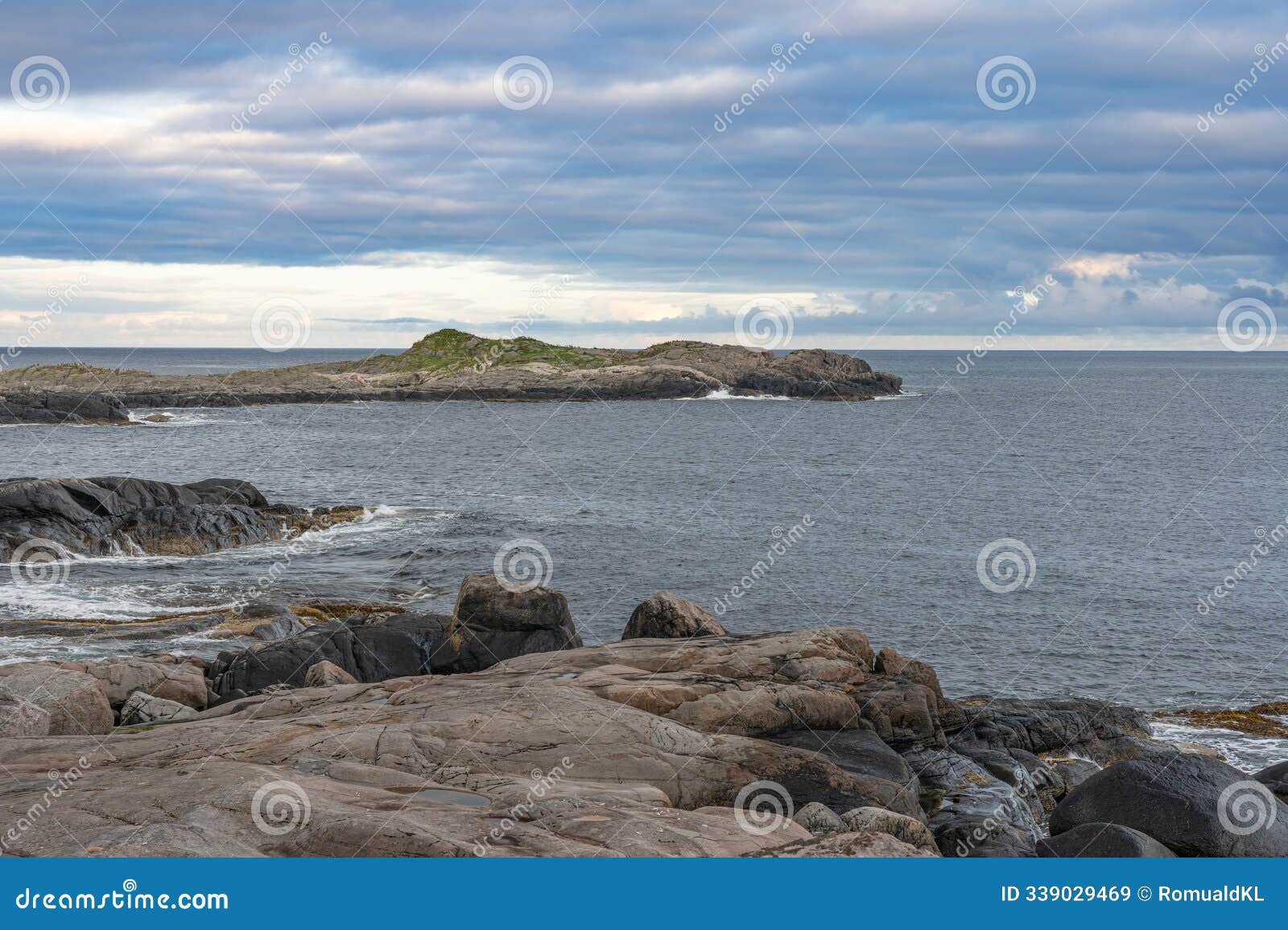 rocky islands with waves crushing ocen view