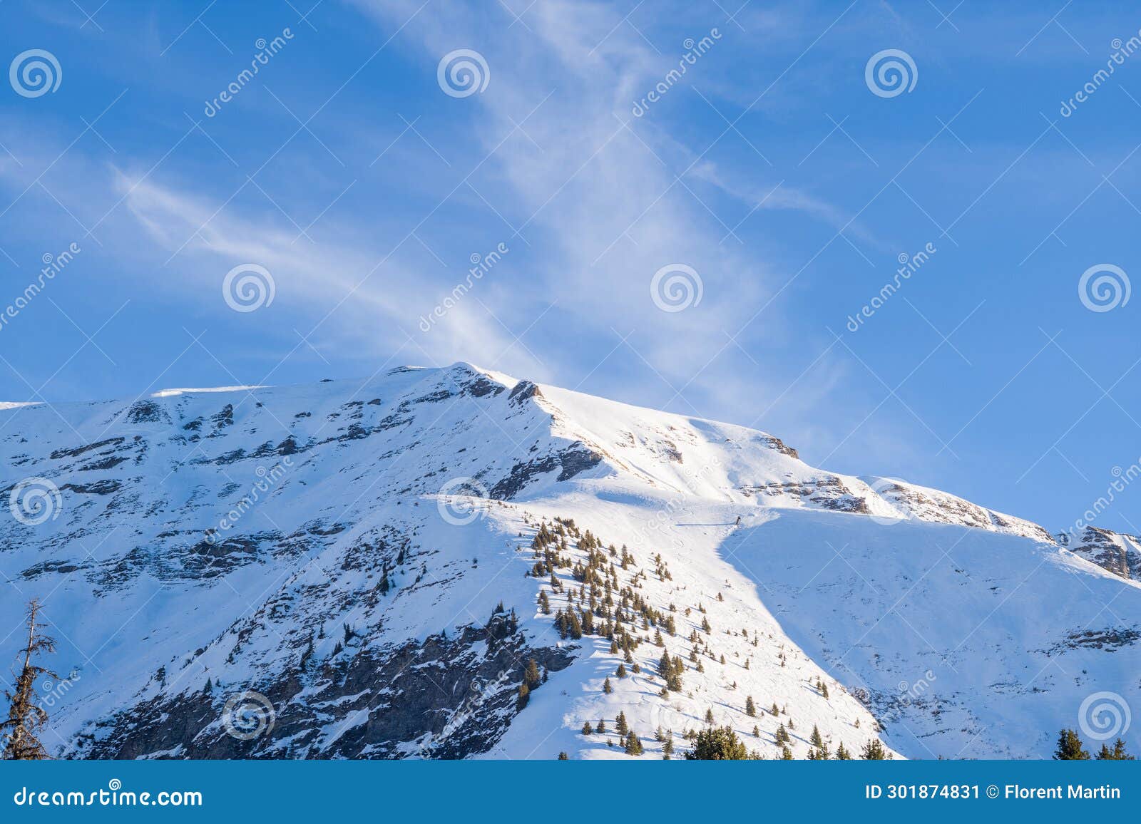 a rocky peak in the mont blanc massif between mont joly and aiguille croche in europe, france, rhone alpes, savoie, alps, in