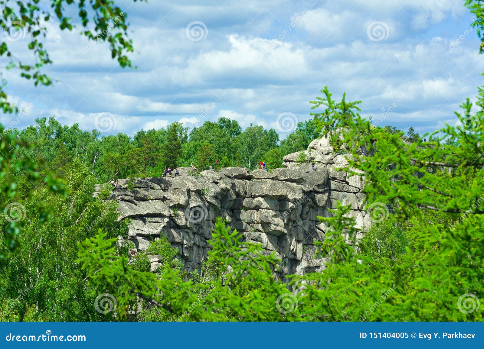 Rocky Ridge with People Wandering Around it Stock Image - Image of mass ...