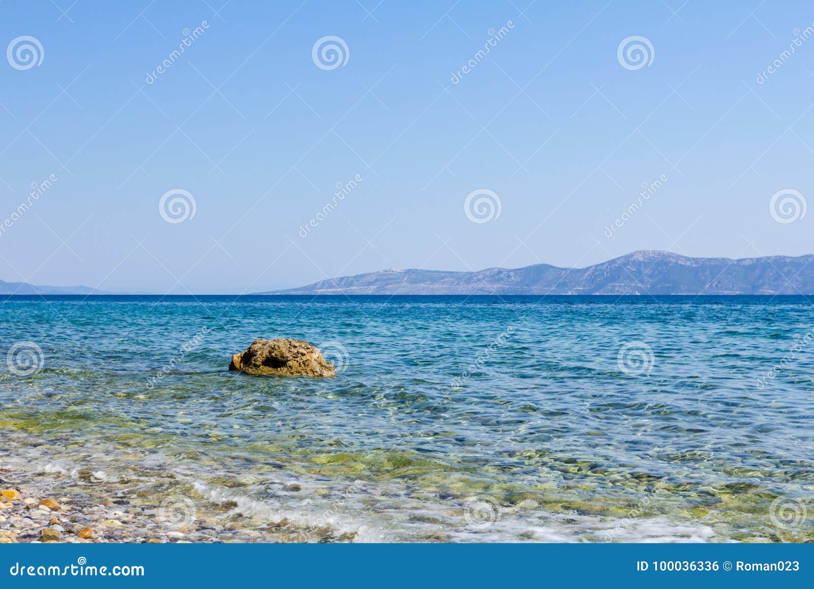 Rock is Sticking Out Above the Shoal Water, Above the Sea Level Stock ...