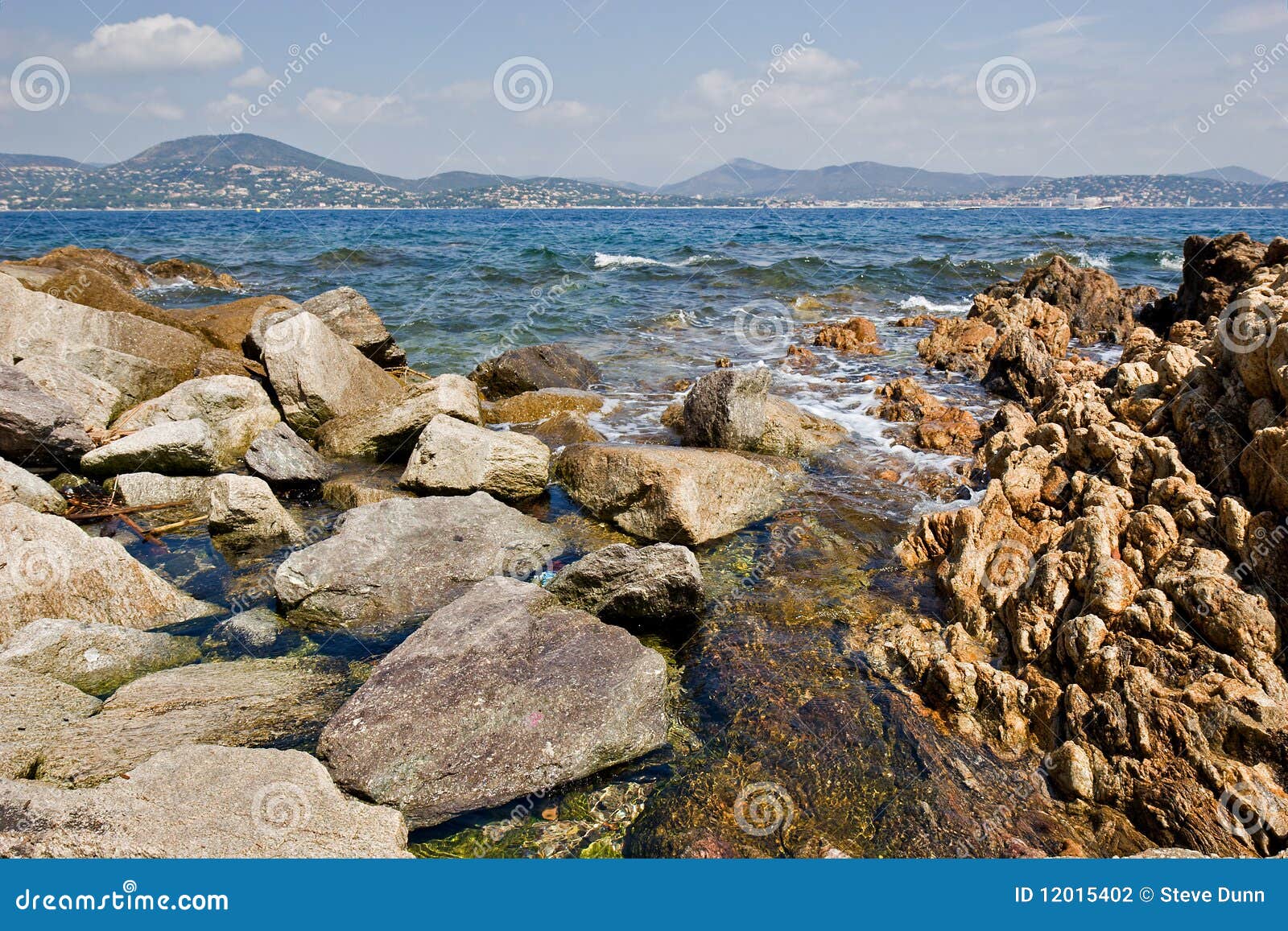 Rocky St-Tropez shoreline stock photo. Image of coast - 12015402