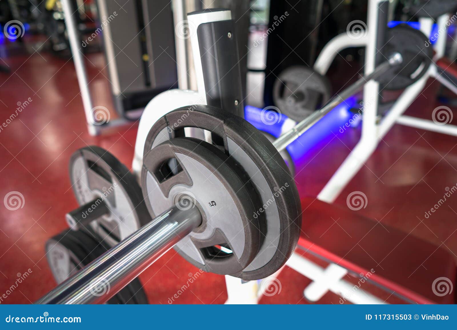 Rod and weights in the gym stock image. Image of objects 117315503