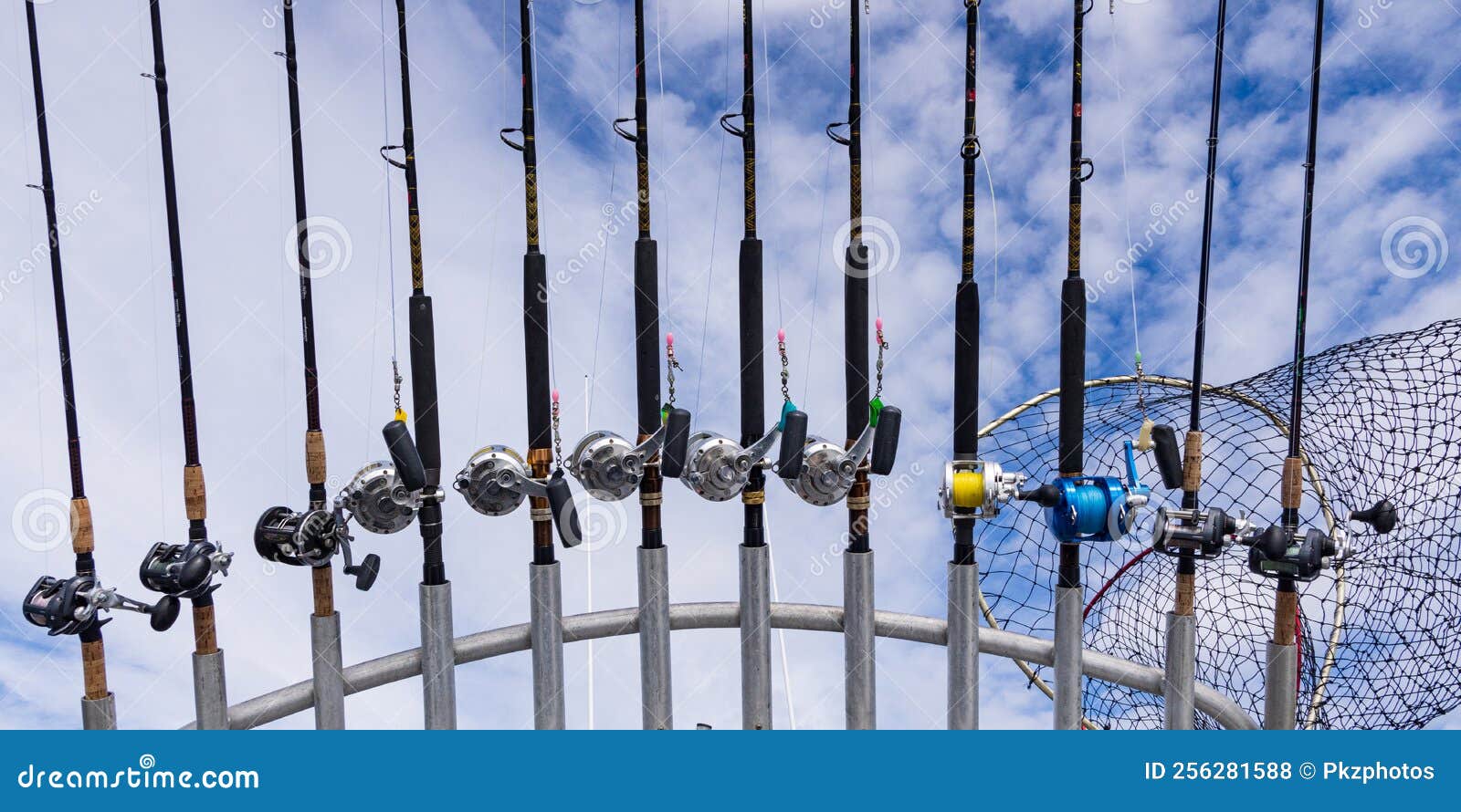 Rods, Reels, and a Big Net stock photo. Image of sound - 256281588