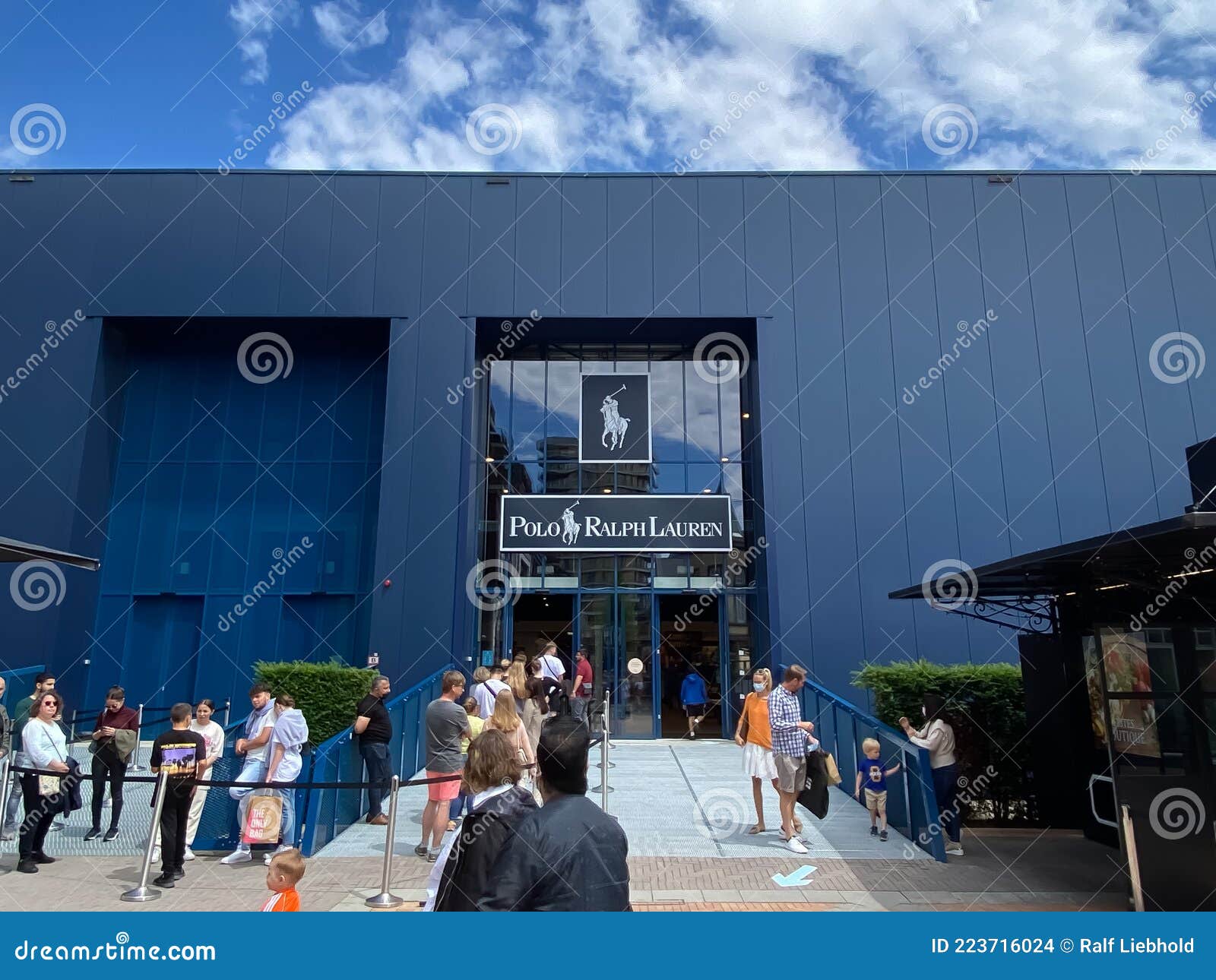 Baars Zuivelproducten Mus View on Blue Facade of Polo Ralph Lauren Fashion Store with Queue of People  Exterior of Entrance Editorial Stock Image - Image of label, entrance:  223716024