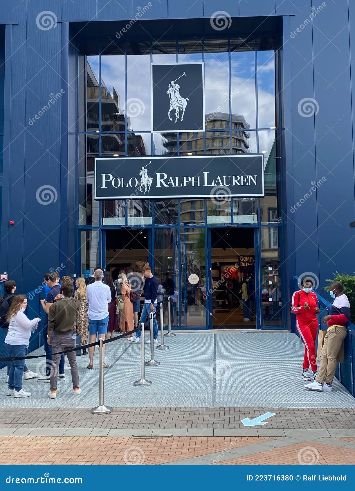 View on Blue Facade of Polo Ralph Lauren Fashion Store with Queue of ...