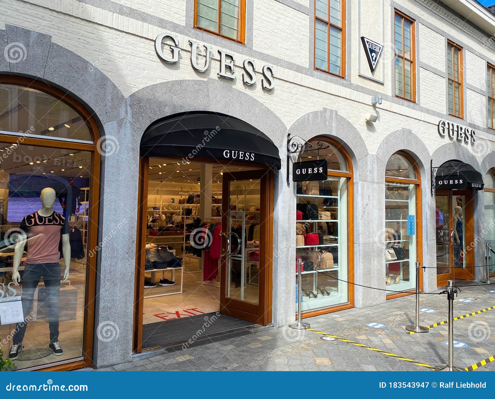 View on Facade with Logo of Guess Fashion Company at Shop Editorial Photography Image of city, design: 183543947