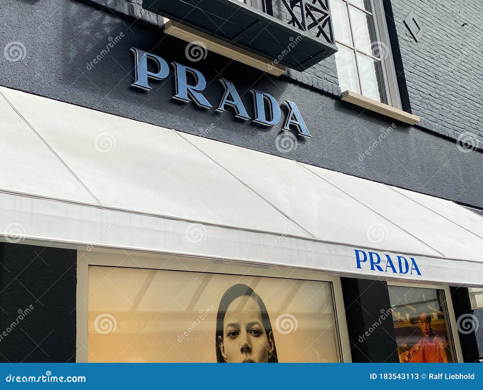 View on Facade with Logo Lettering of Prada Fashion Company at Shop ...