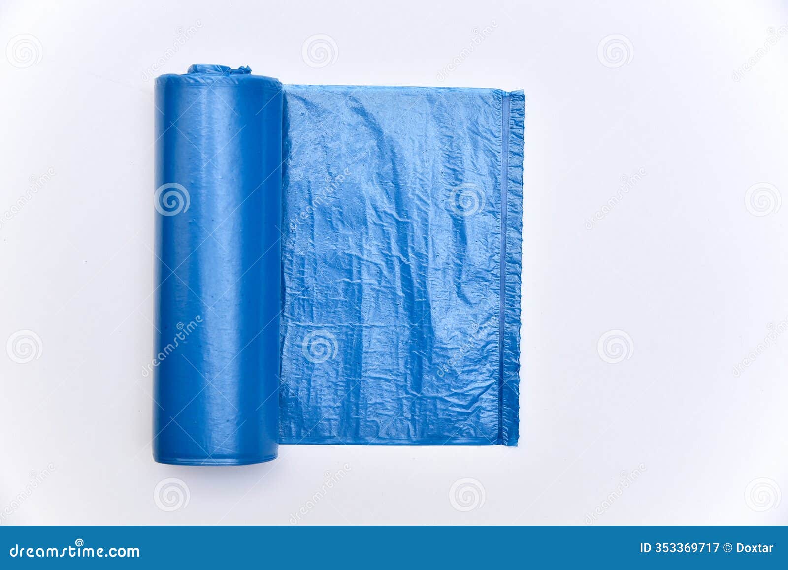 roll of blue garbage bag top view  on white background