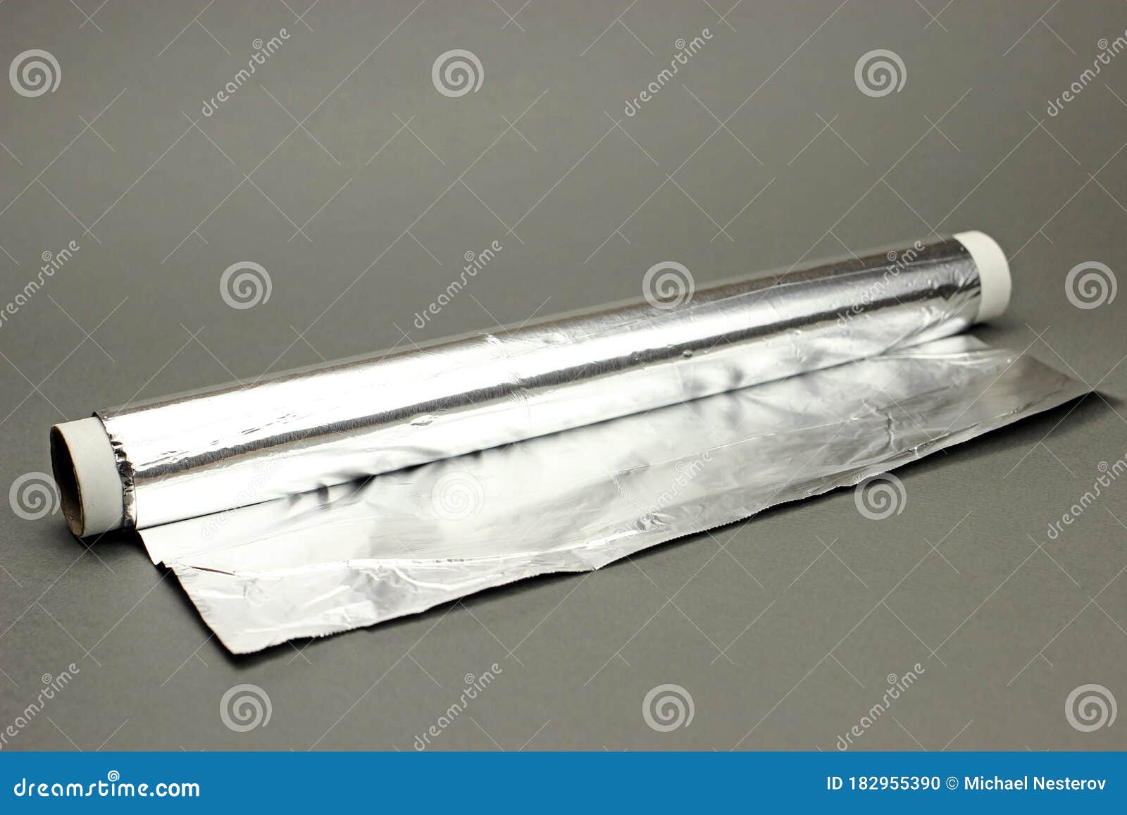 Roll of Kitchen Foil on a Gray Background Stock Photo Image of