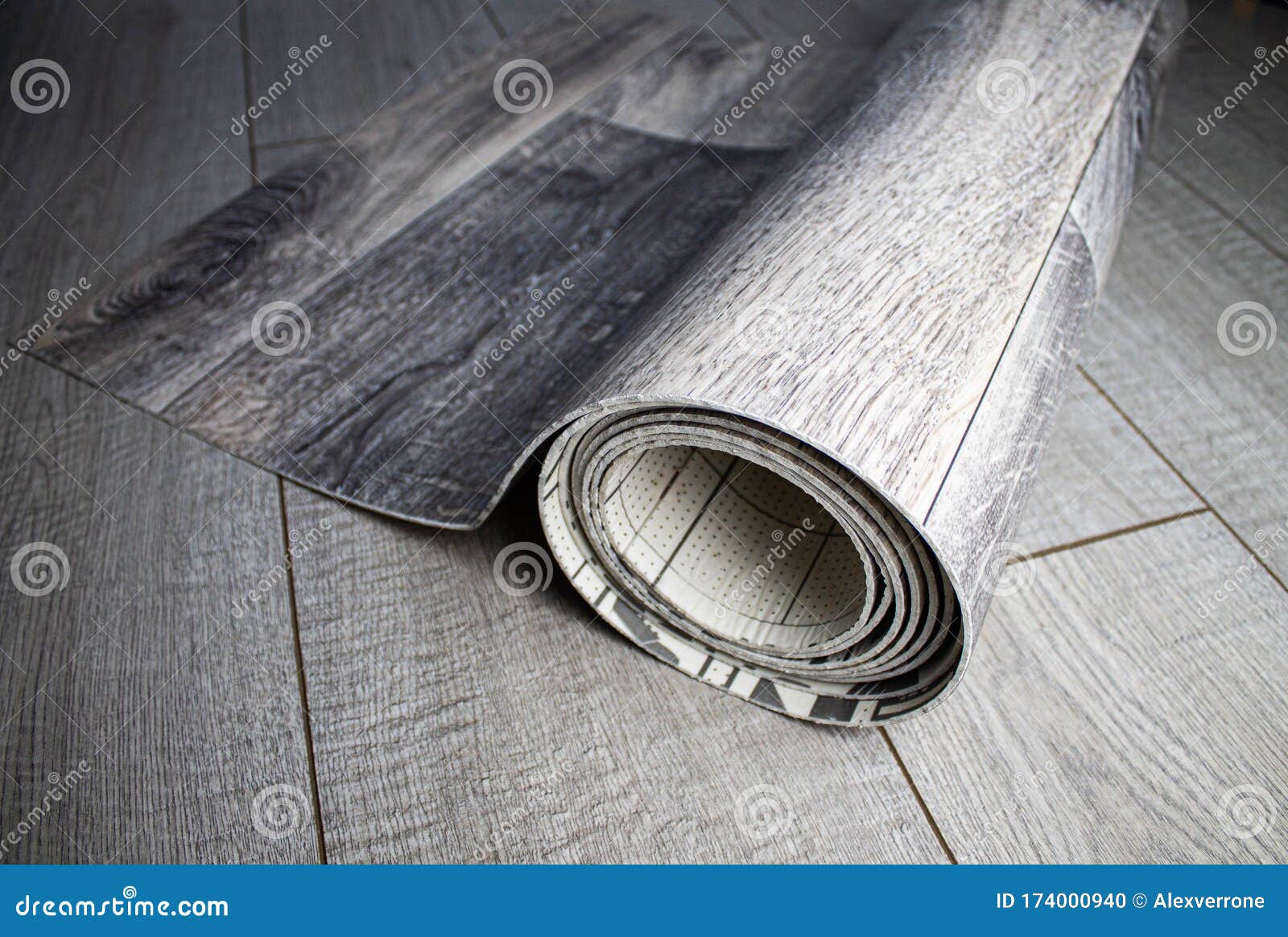 Roll of Linoleum with a Wood Texture. Linoleum Cutting. Floor Coverings