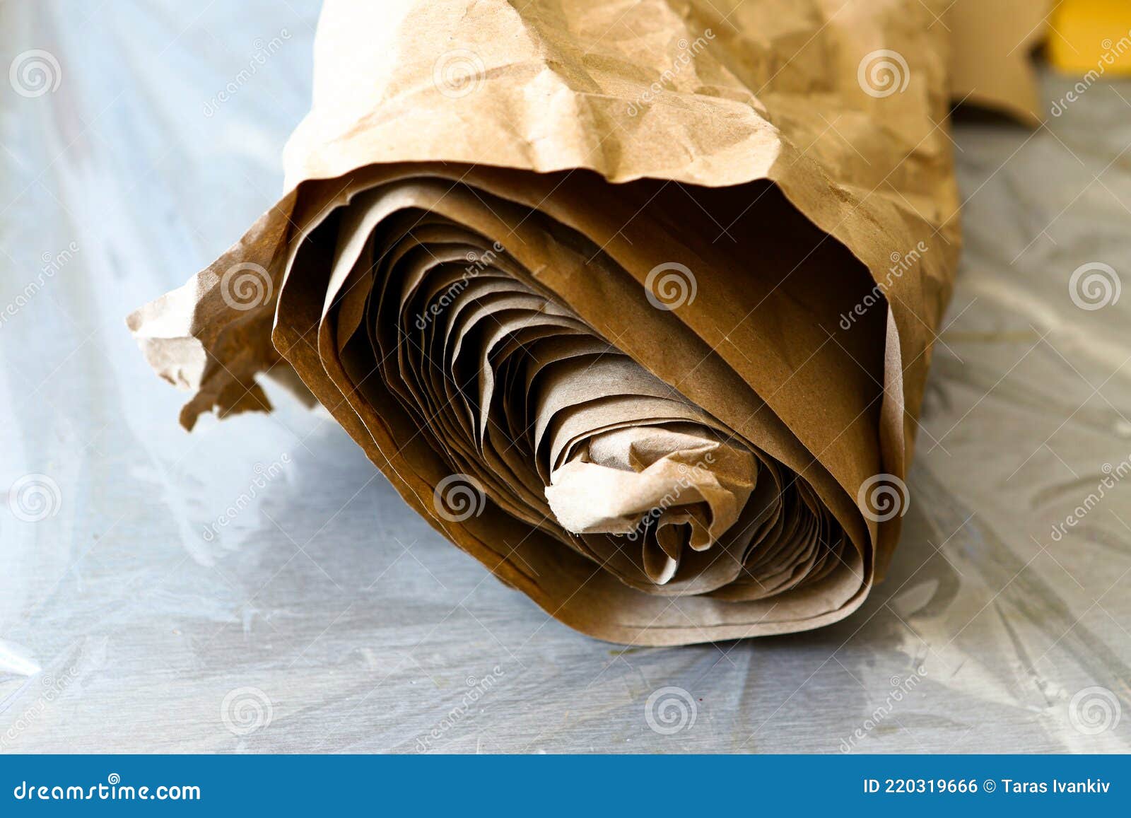 Roll of Old Crumpled Packaging, Kraft Brown Paper. Stock Photo Image