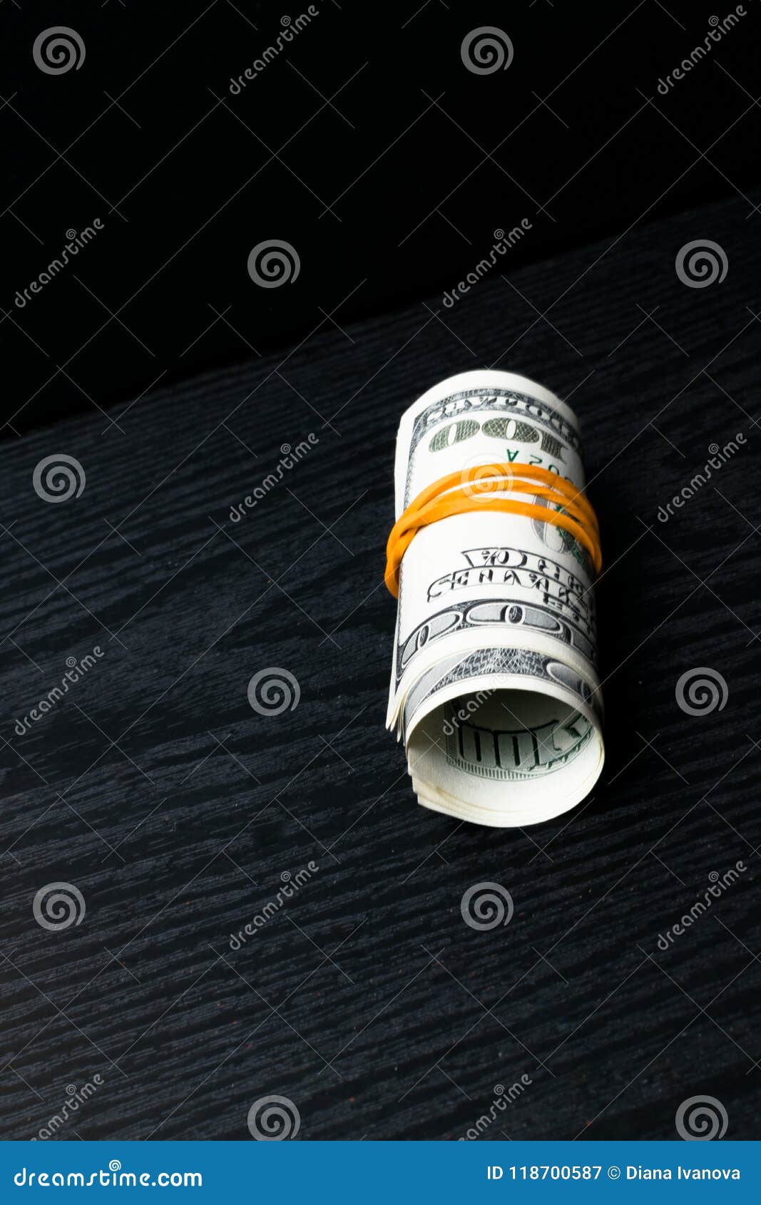 Rolled American Dollars Banknotes on Oak Wood. Stock Image Image of