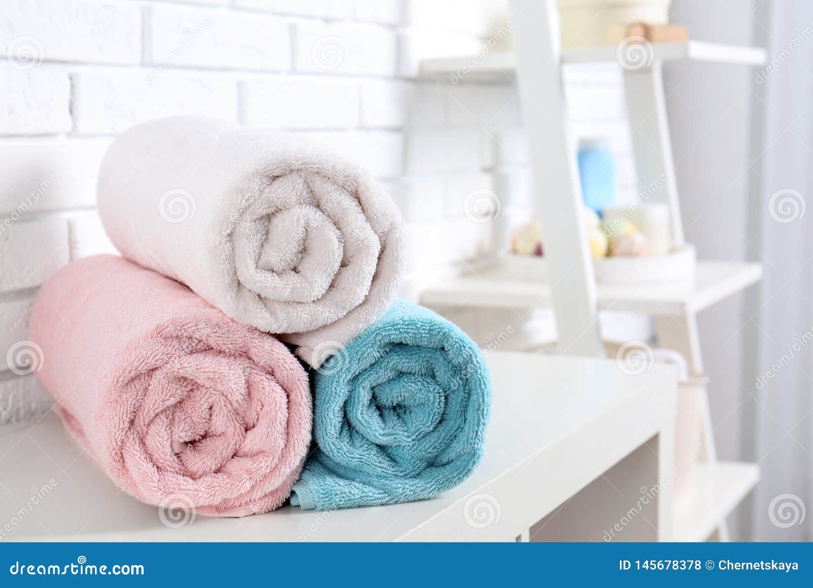 Rolled Fresh Towels on Table in Bathroom Stock Photo Image of body