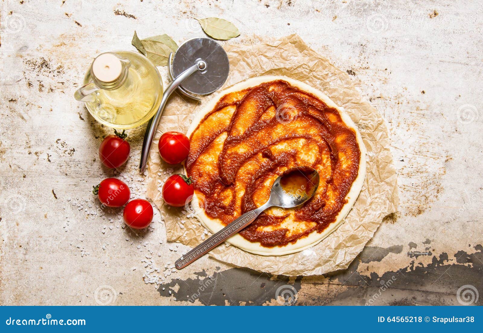 The Rolled Out Pizza Dough with Tomatoes, Tomato Paste and Olive Oil