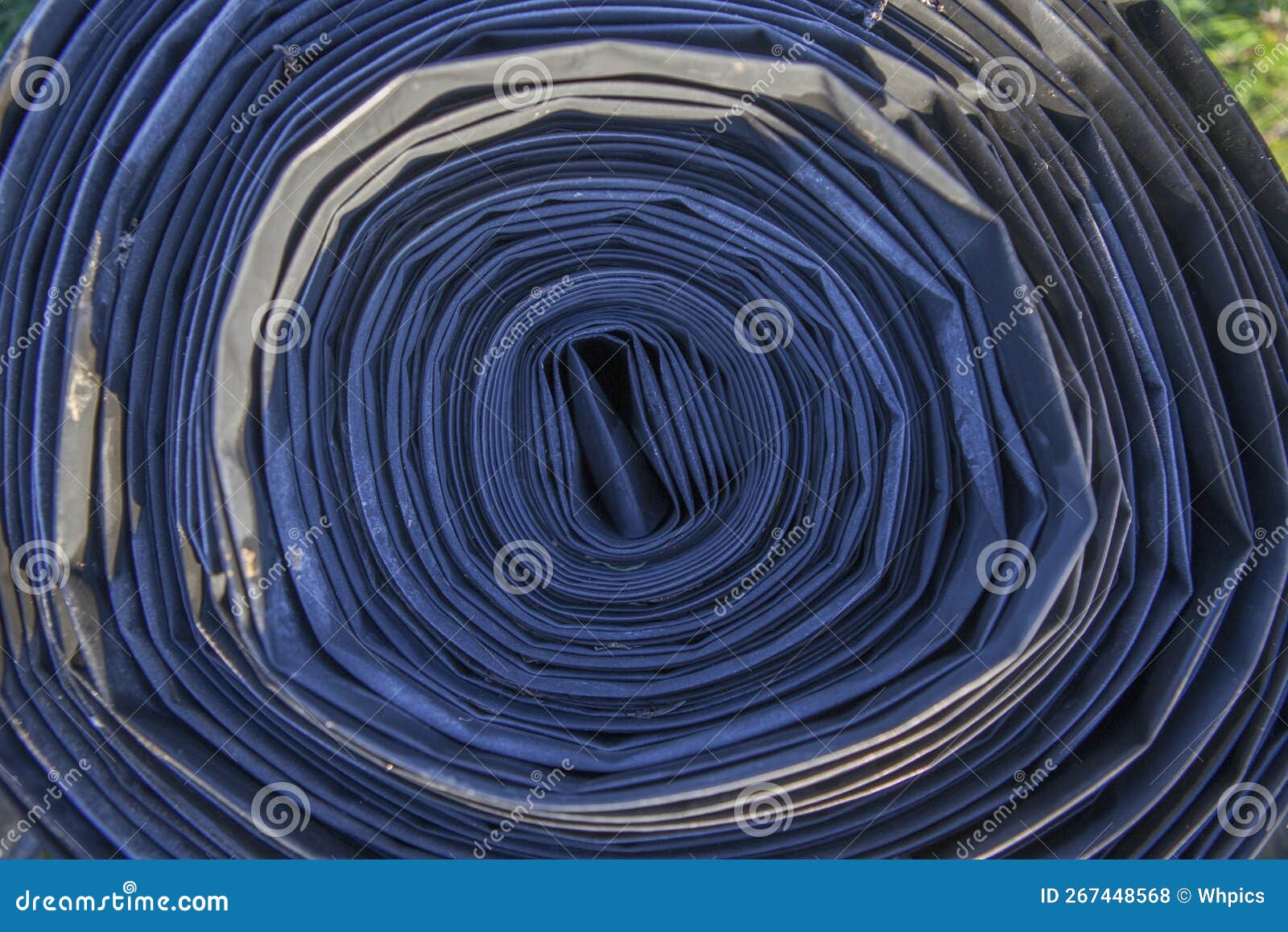 rolled tape of flexible irrigation tubing system