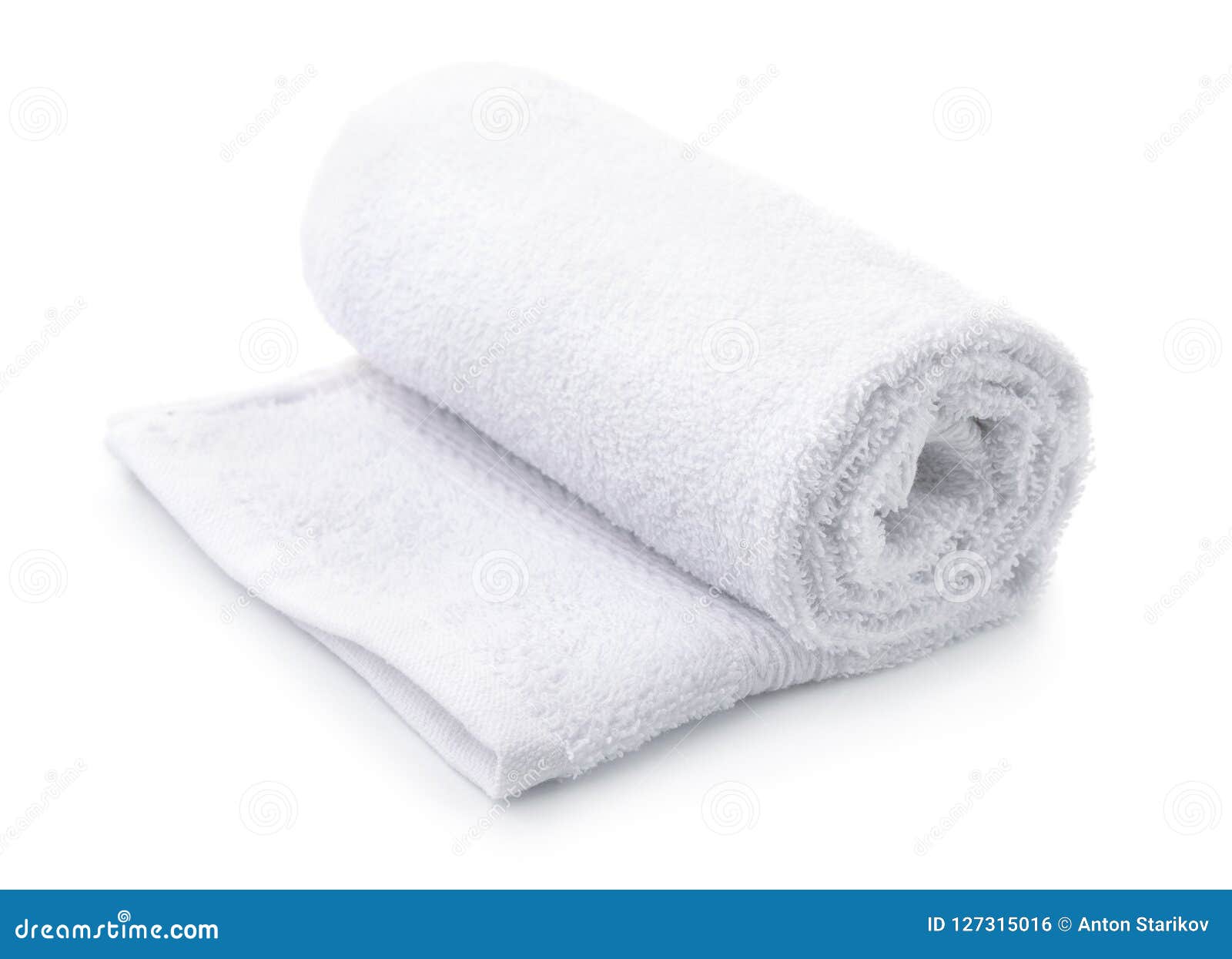 rolled up white terry towel