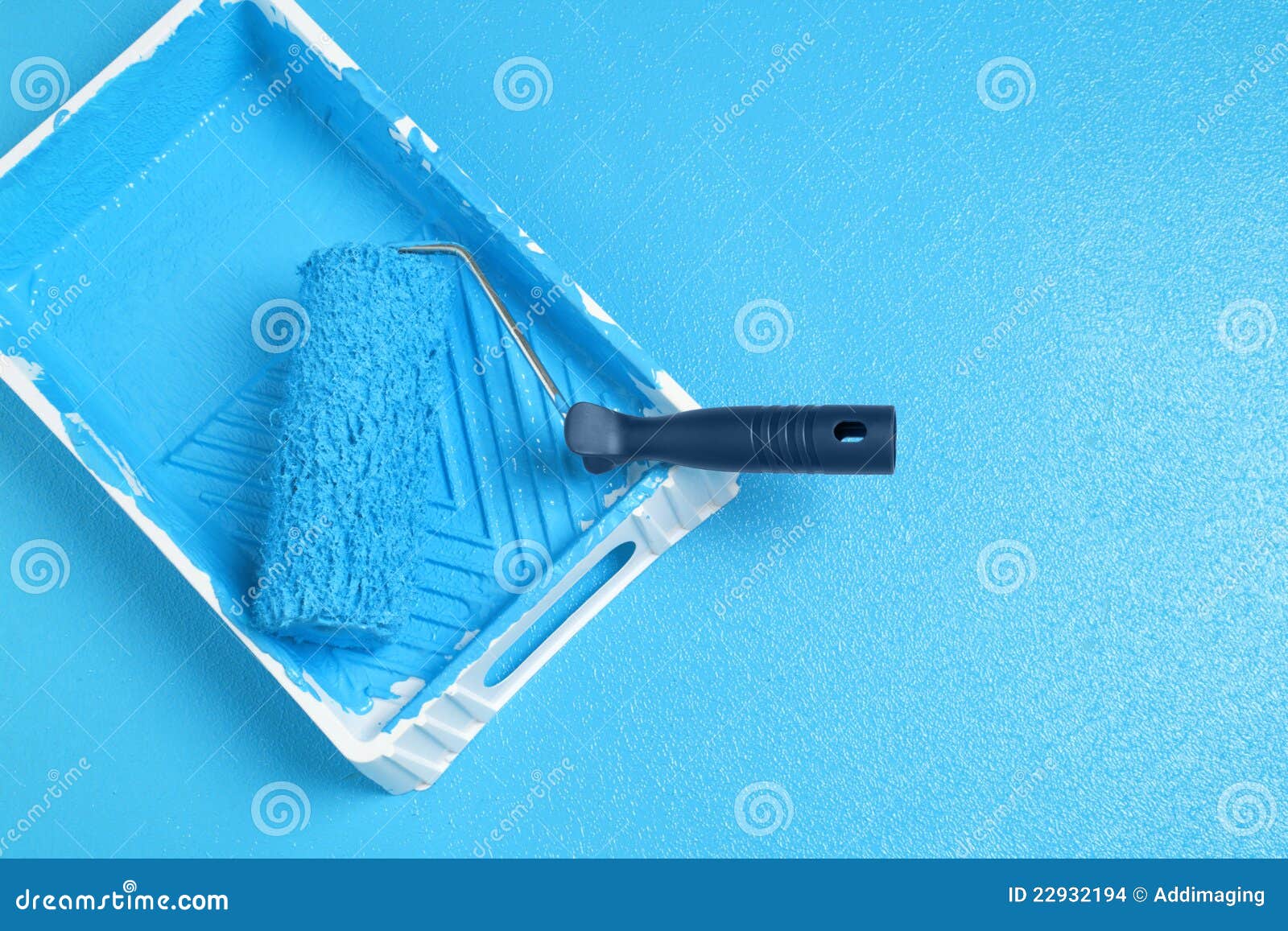 Roller with blue paint stock photo. Image of close, renovation 22932194