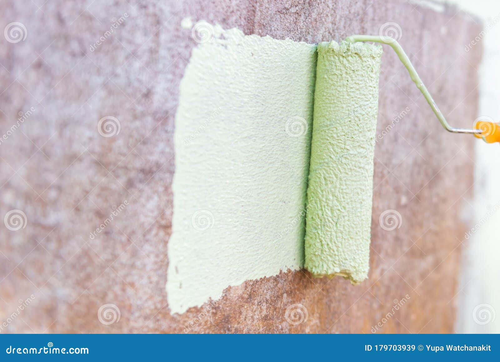 Roller Brush Painting, Worker Painting on Surface Wall Stock Image