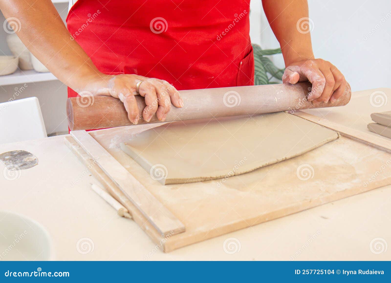 Rolling Clay with a Rolling Pin. Cropped Image of an Unrecognizable