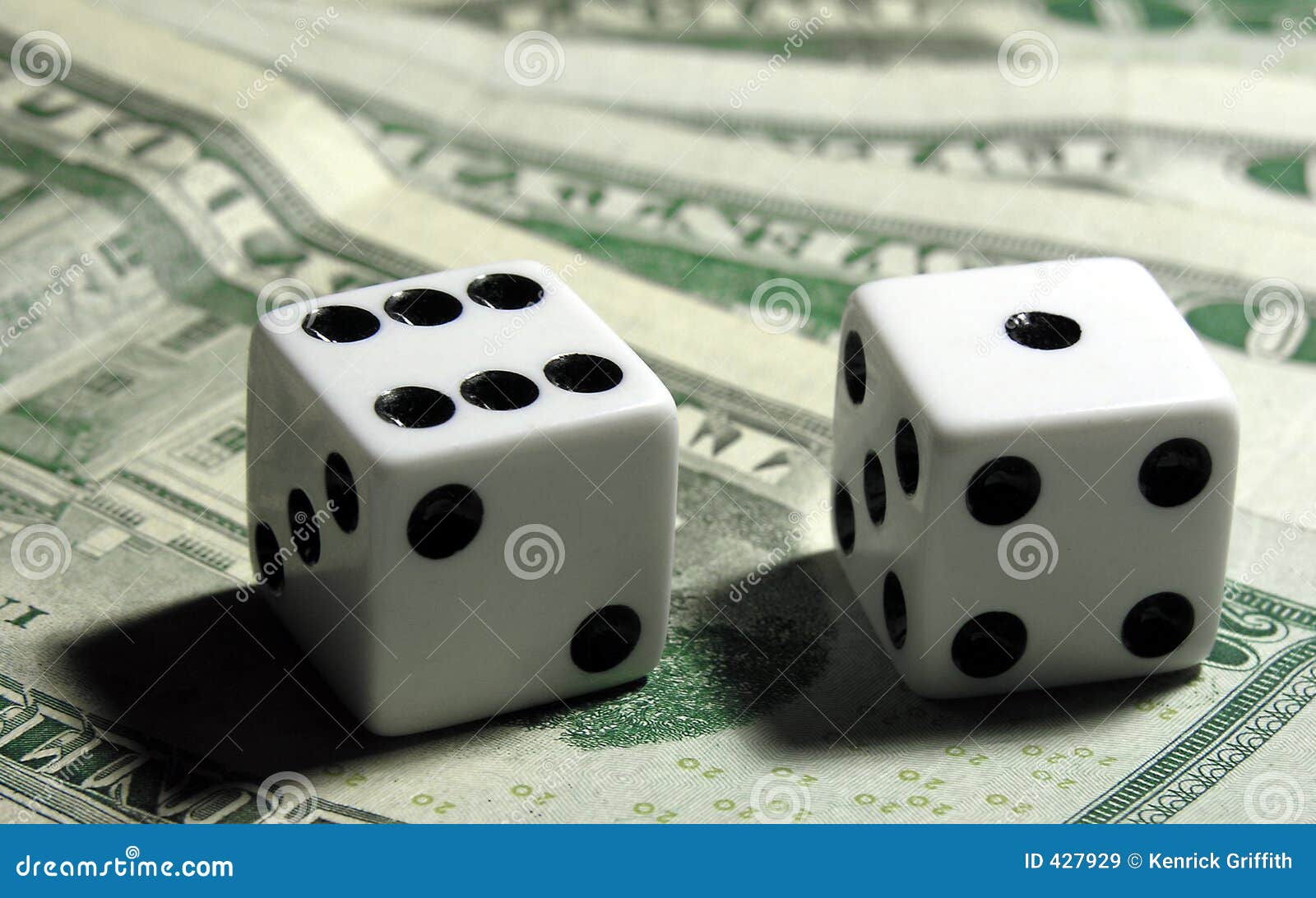 Rolling the Dice stock image. Image of gambling, dice, shadow 427929