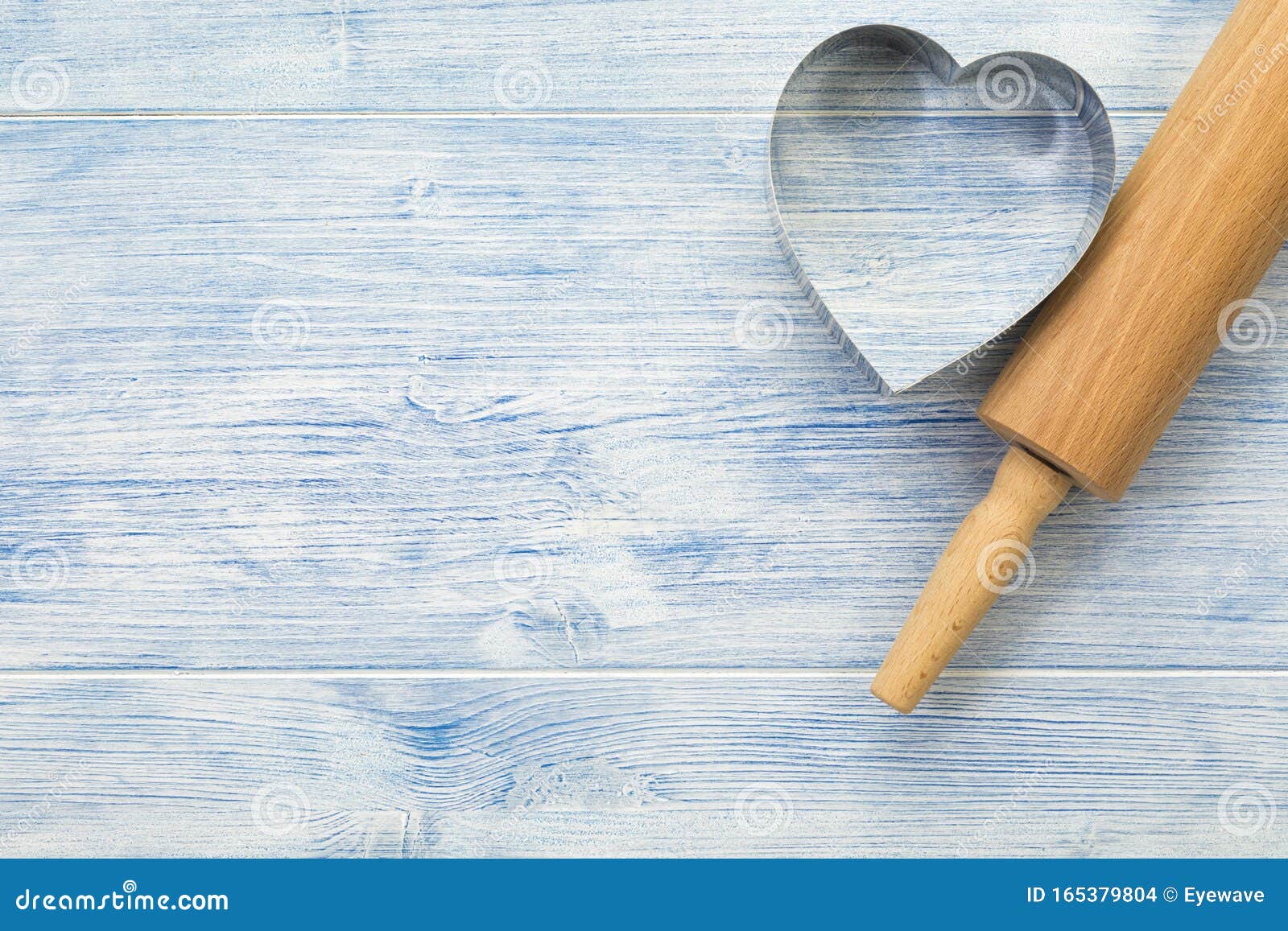 Rolling Pin And Heart Shaped Cookie Cutter On Wood Background With Copy