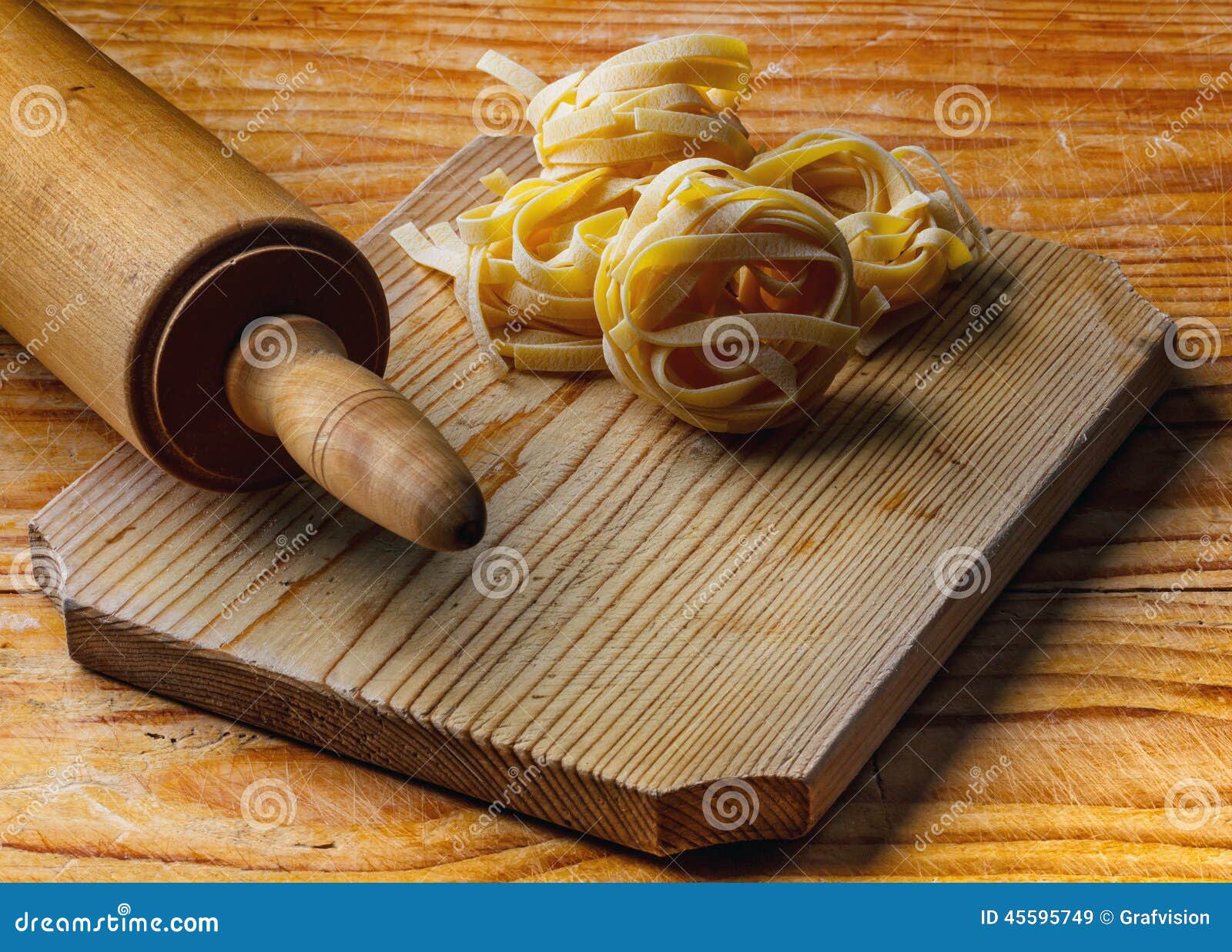 Rolling pin with pasta stock image. Image of background 45595749