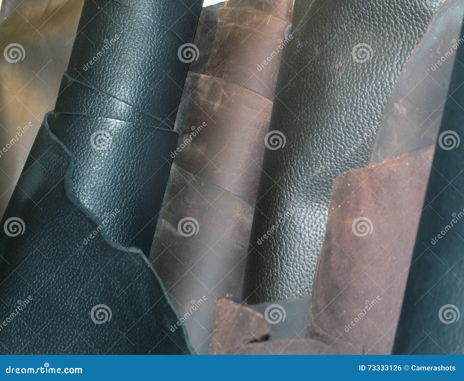 Rolls of Boot and Shoe Leather Leaning Against a Wall Stock Photo ...