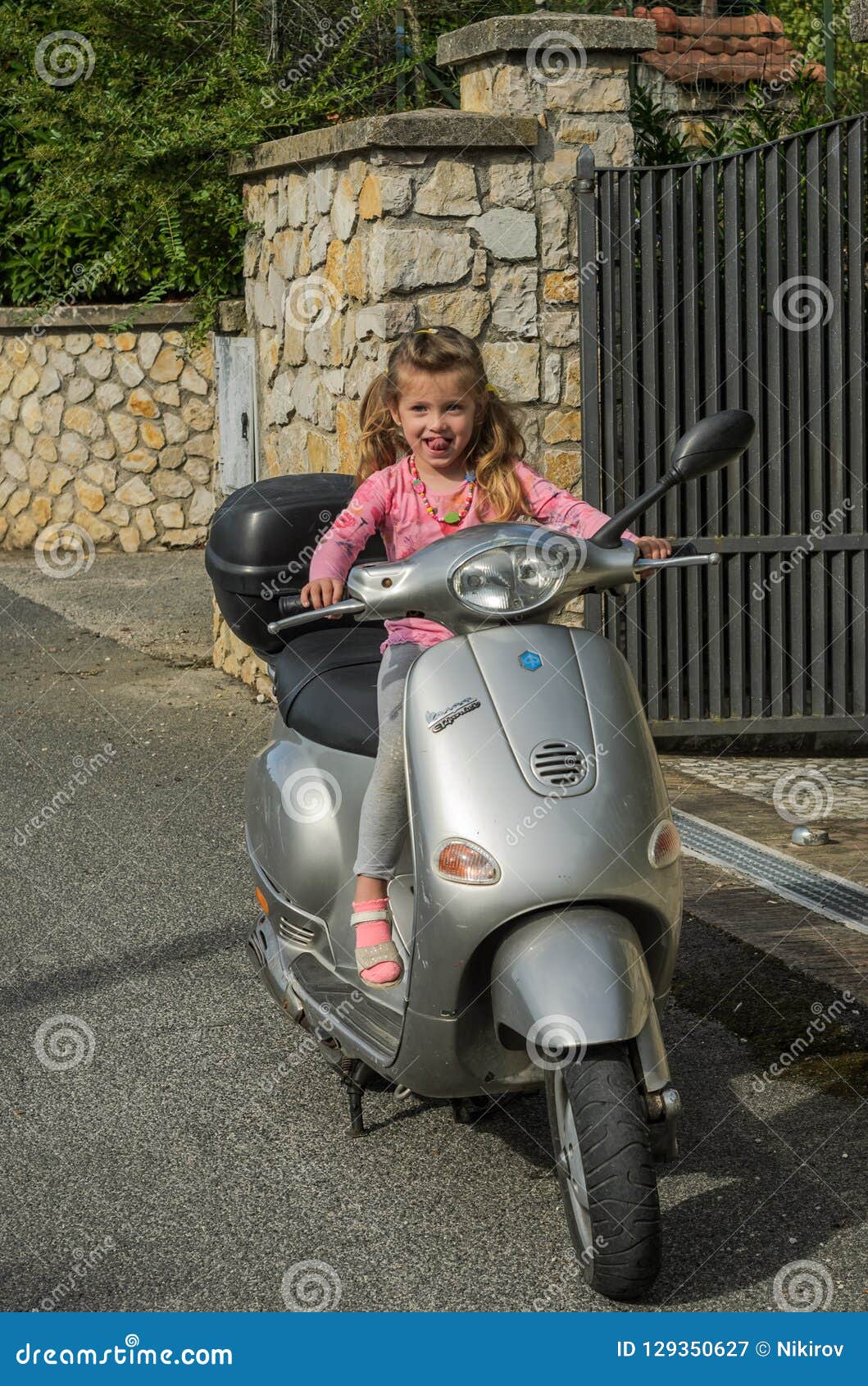 girl riding vespa