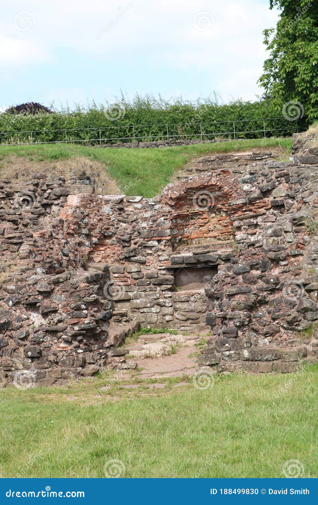 ROMAN AMPHITHEATRE CAERLEON. ROMAN FORTRESS OF ISCA BUILT AROUND 90 AD.HEADQUARTERS FOR THE LEGIO ll AUGUSTA, FROM ABOUT 75 TO 300 AD. THE ROMANS CALLED THE SIT ISCA AFTER THE RIVER USK WELSH WYSG