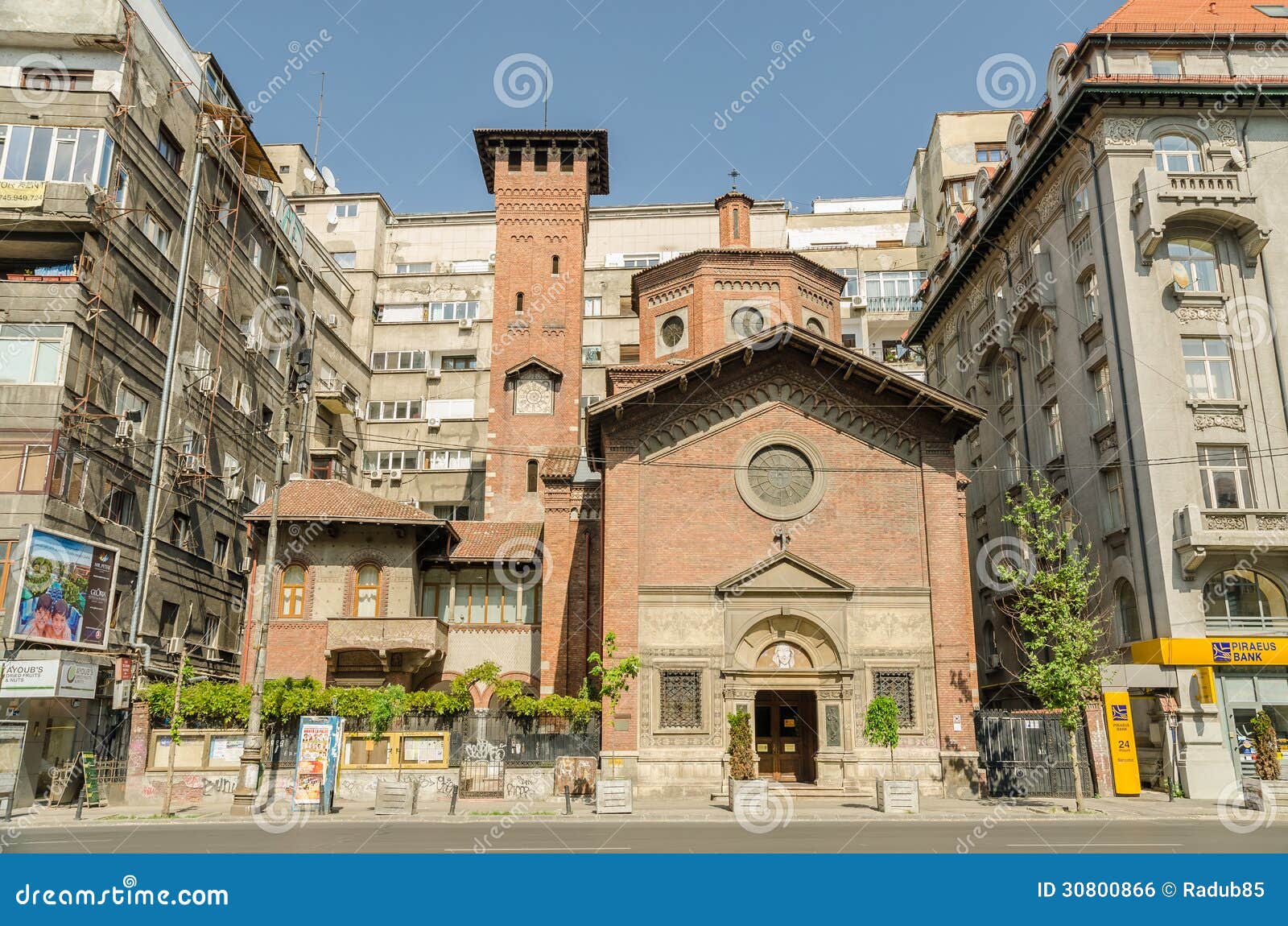 Roman Catholic Church. BUCHAREST, ROMANIA - MAY 05: The Italian Church of the Most Holy Redeemer facade on May 05, 2013 in Bucharest, Romania. The church neo-gothic red brick edifice was built in 1930.