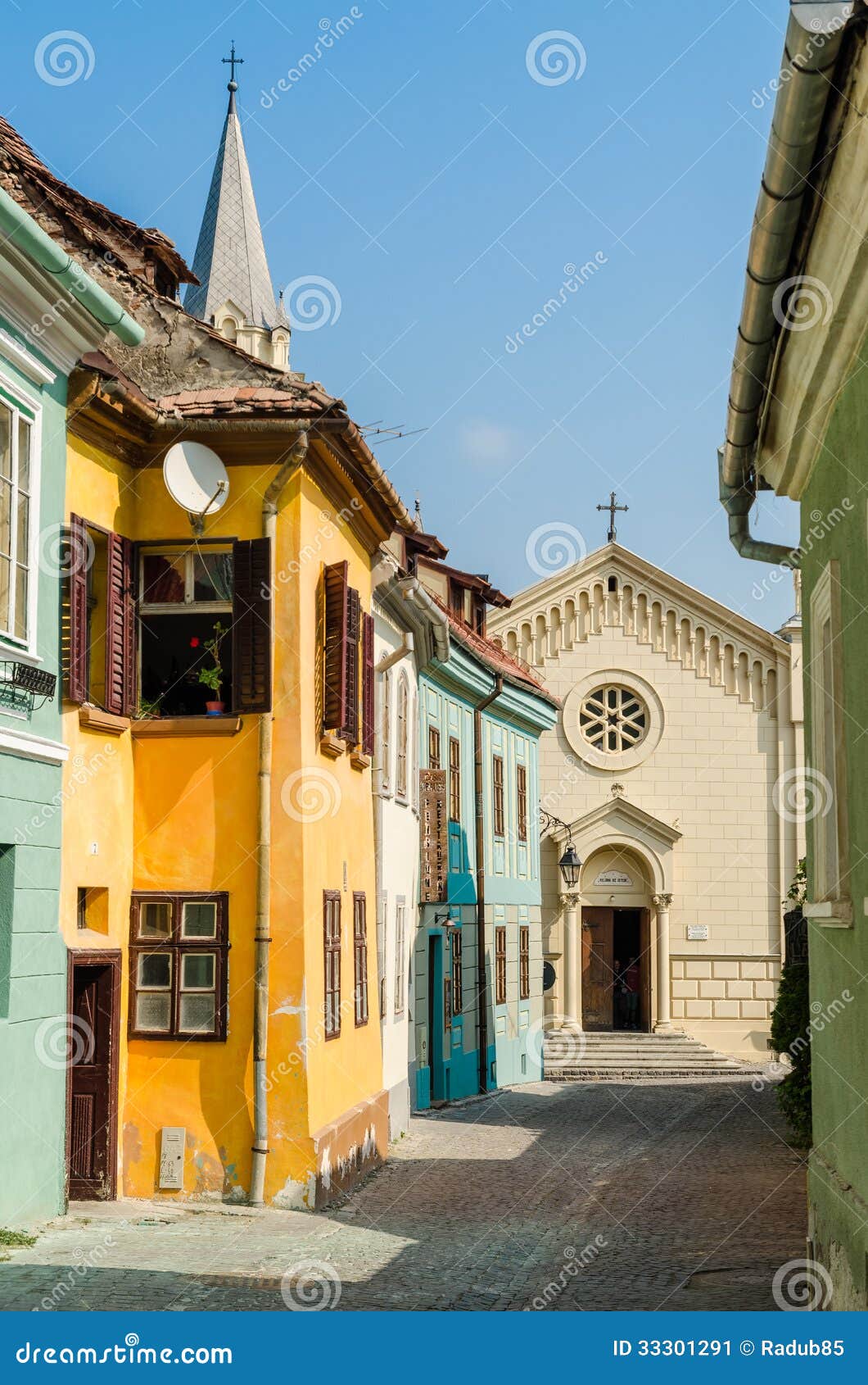 SIGHISOARA, ROMANIA - AUGUST 23: The Roman Catholic Church Saint Joseph on August 23, 2013 in Sighisoara, Romania. Built in 1895, it is one of the oldest buildings in the medieval city Sighisoara.