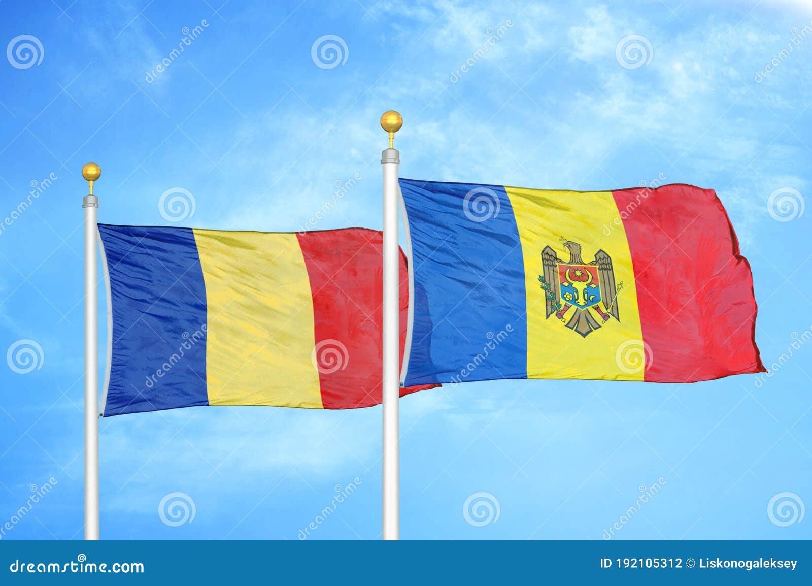 romania and moldova two flags on flagpoles and blue sky