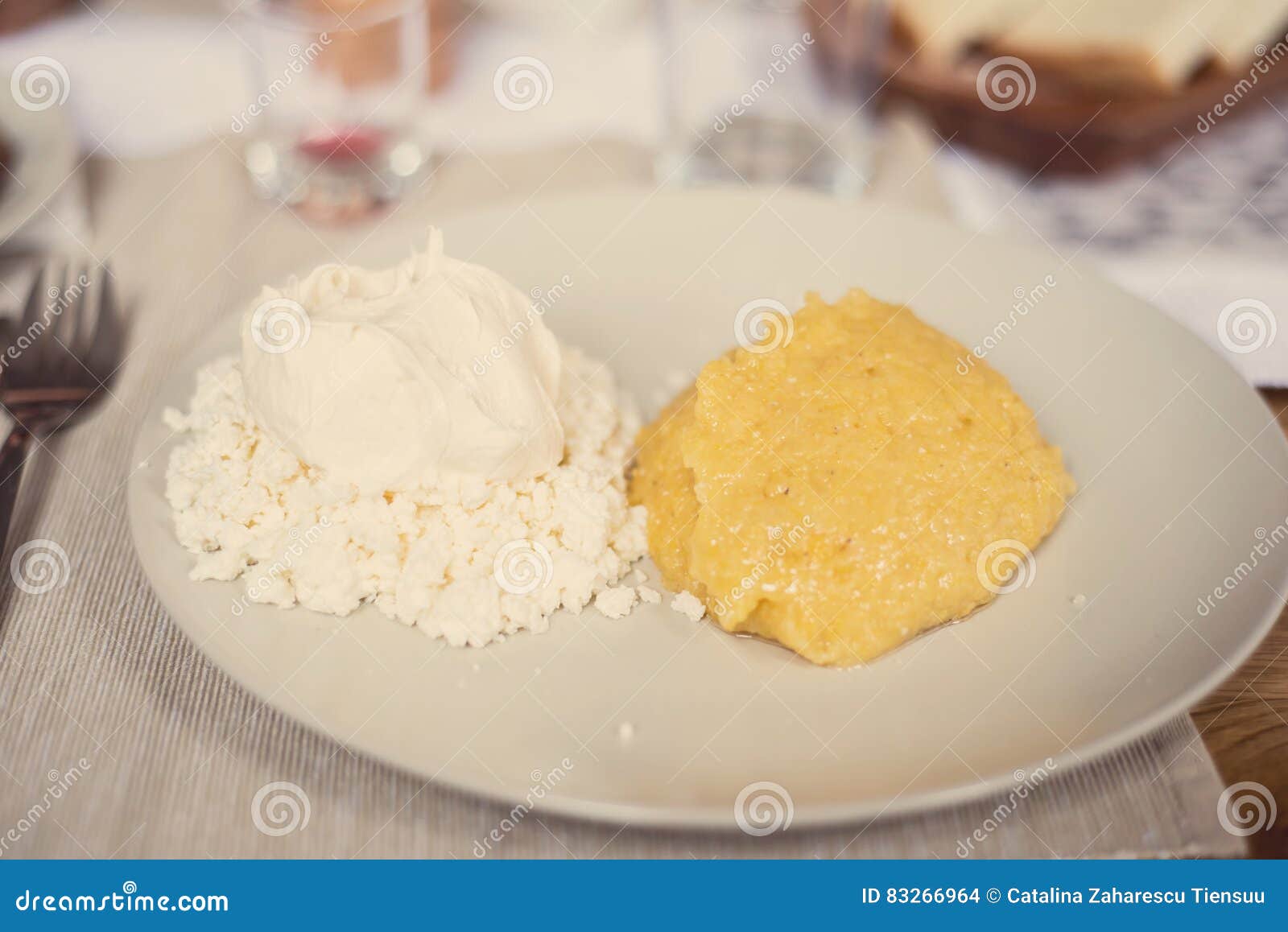 Romanian Polenta Dish with Cheese and Sour Cream Stock Photo Image of