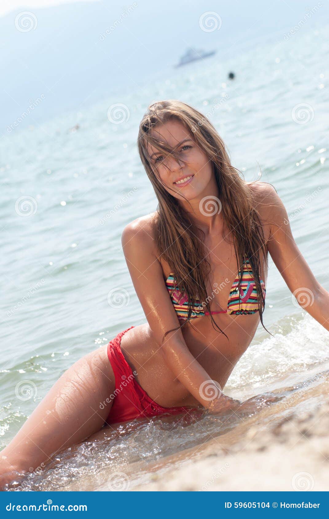 Romanian Woman with Bikini in Hellenic Beach Stock Photo