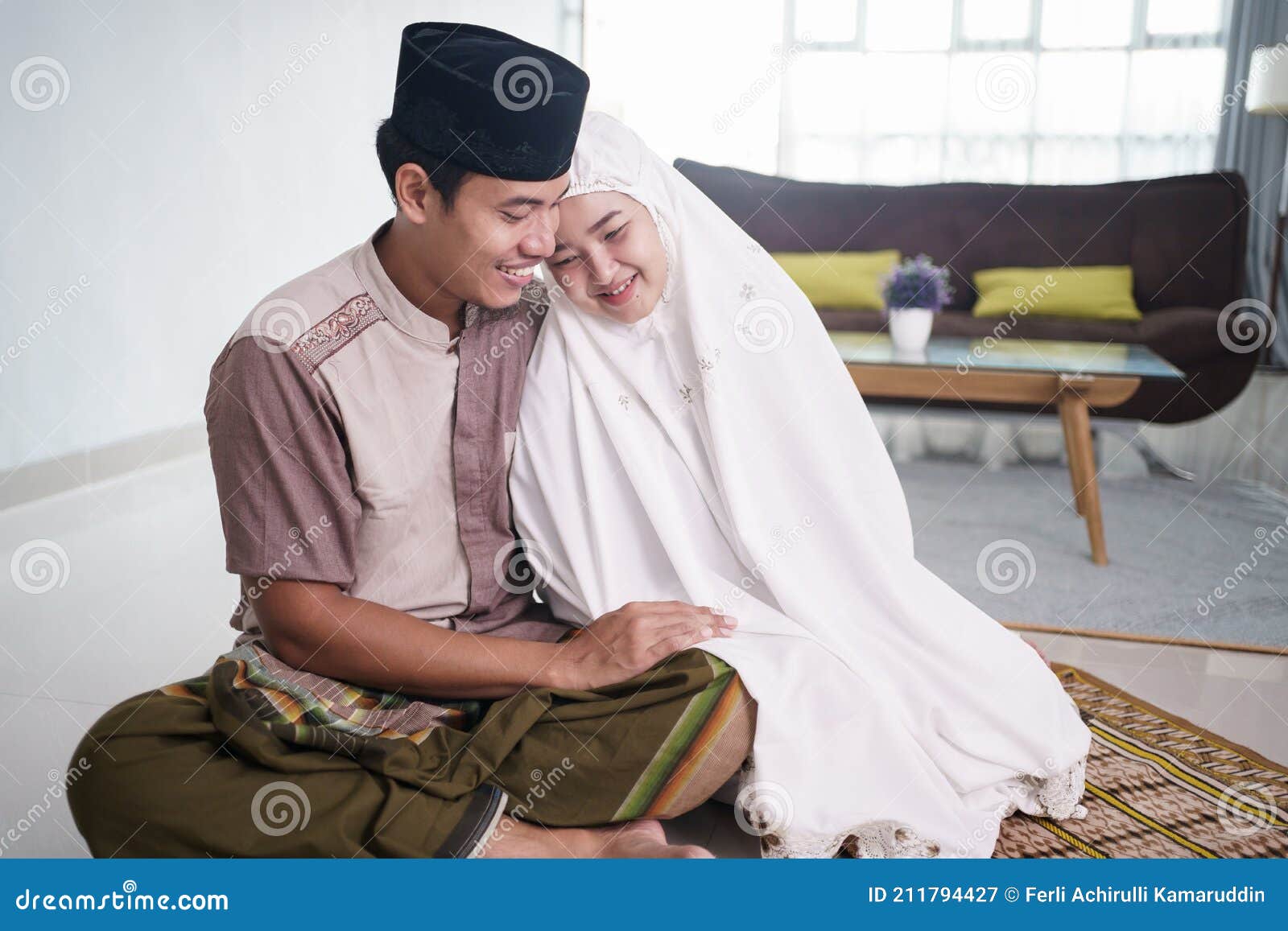 Asian Muslim Couple after Praying Together at Home Stock Image ...