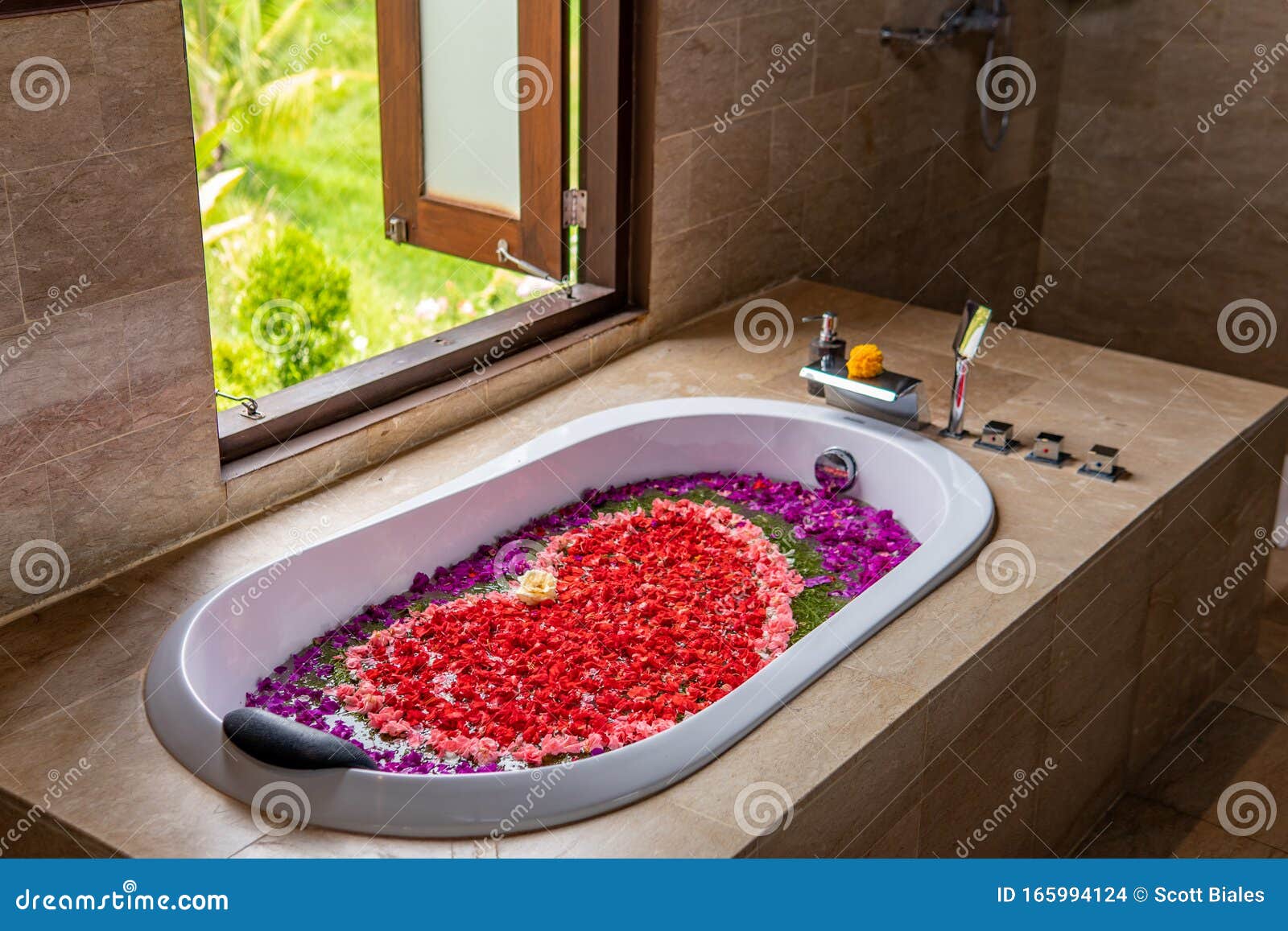 Romantic bathtub with flower petals and , Stock Video