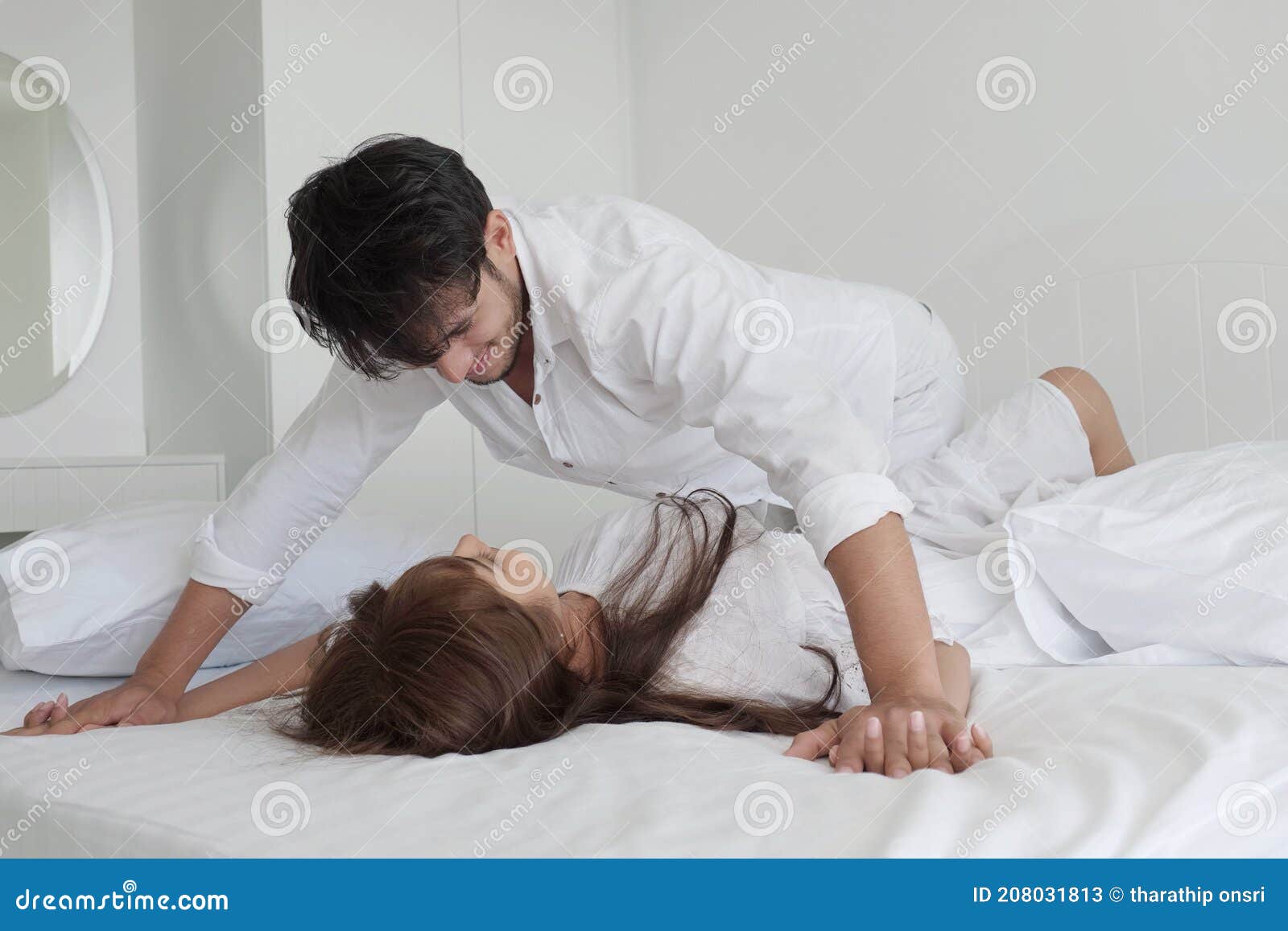A Romantic Couple in Bedroom Stock Image - Image of romantic ...