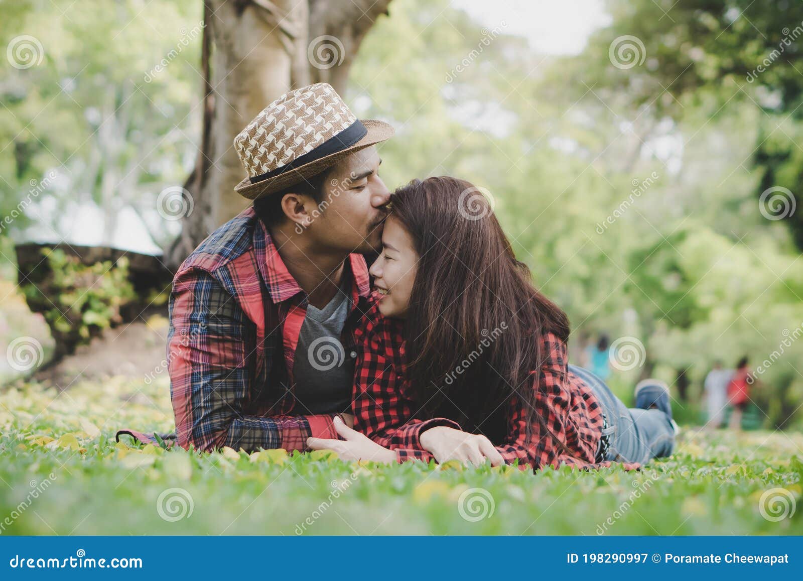 Romantic Couple Dating in the Park. Men Surprises Girlfriend by ...